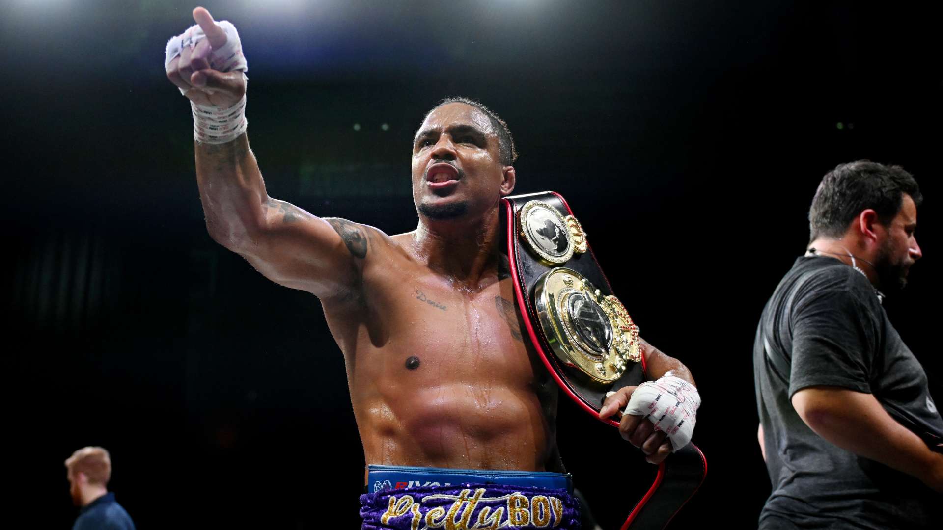 Anthony Taylor celebrates victory with his Belt