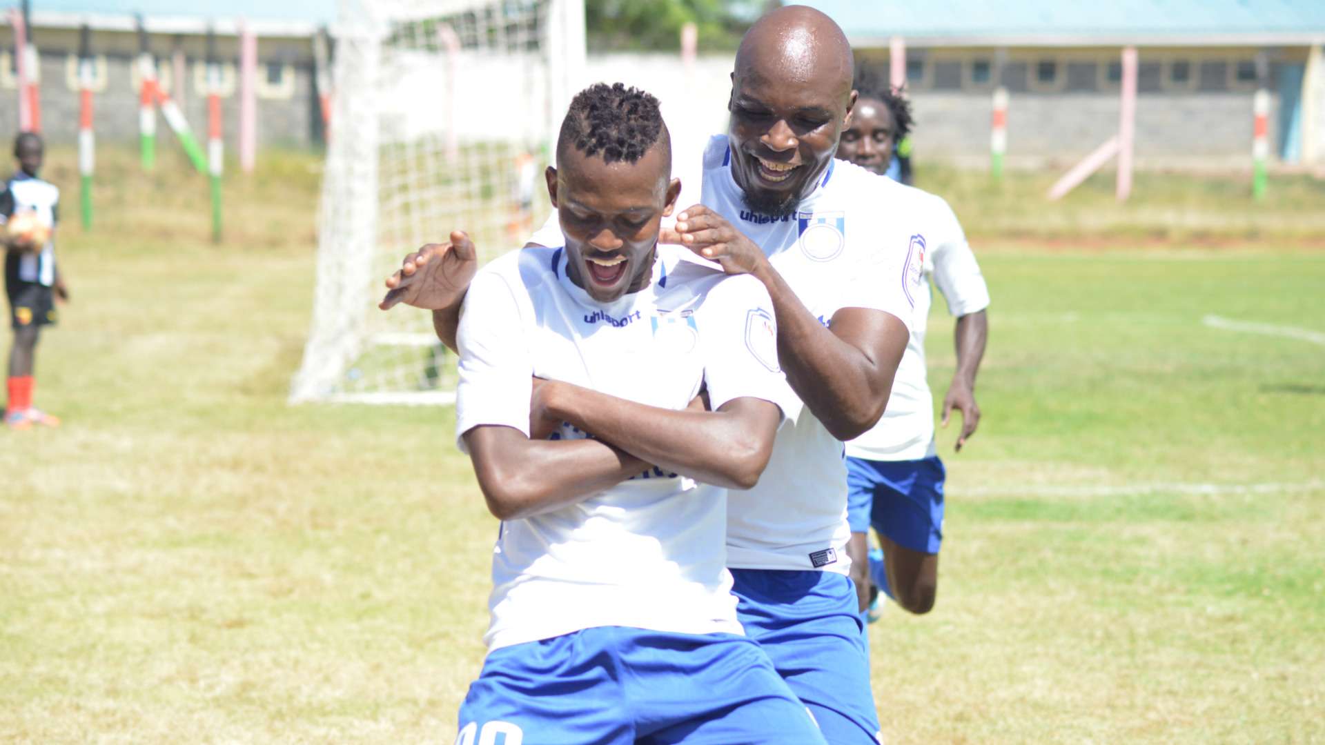 Hassan Abdalla and Wycliffe Ochomo of Bandari FC celebrates his goal against mt kenya fc.