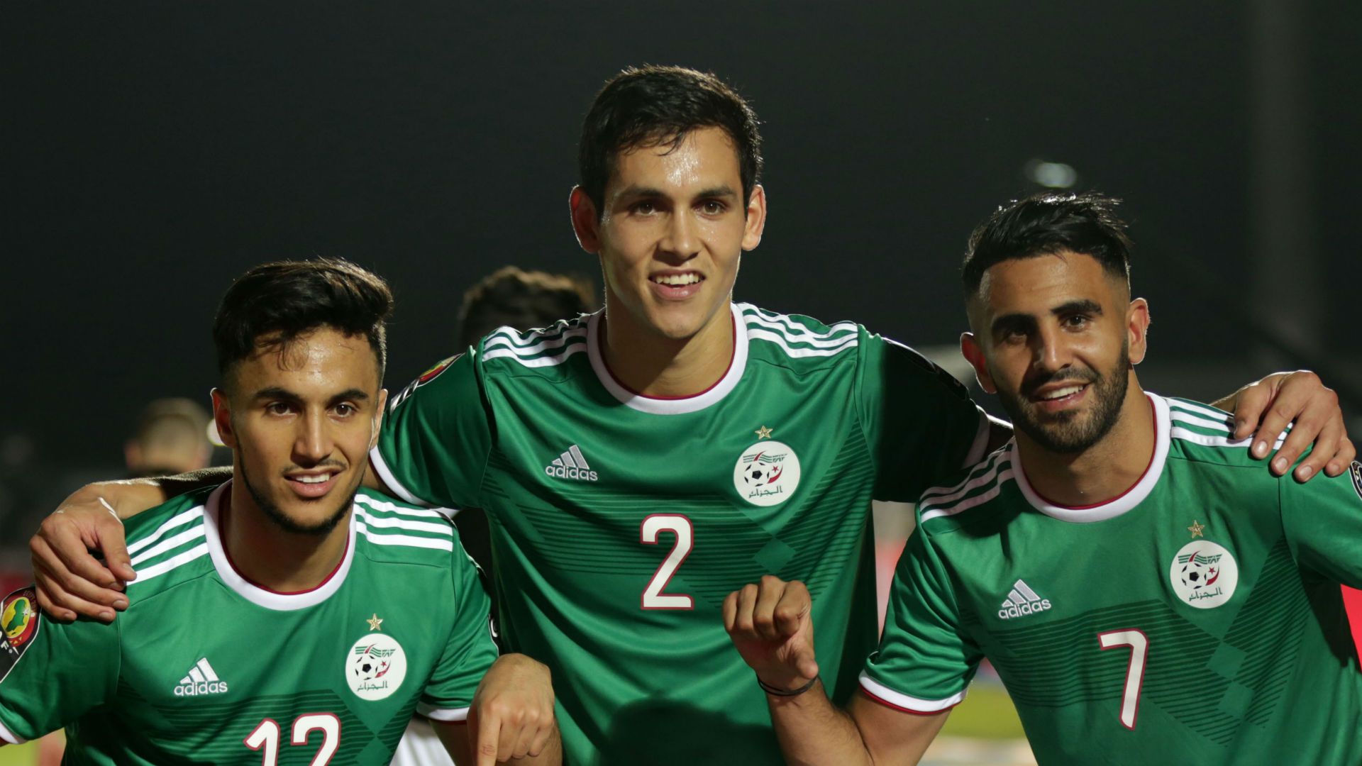 Adam Ounas, Aissa Mandi and Riyad Mahrez of Algeria celebrates a victory during Afcon 2019