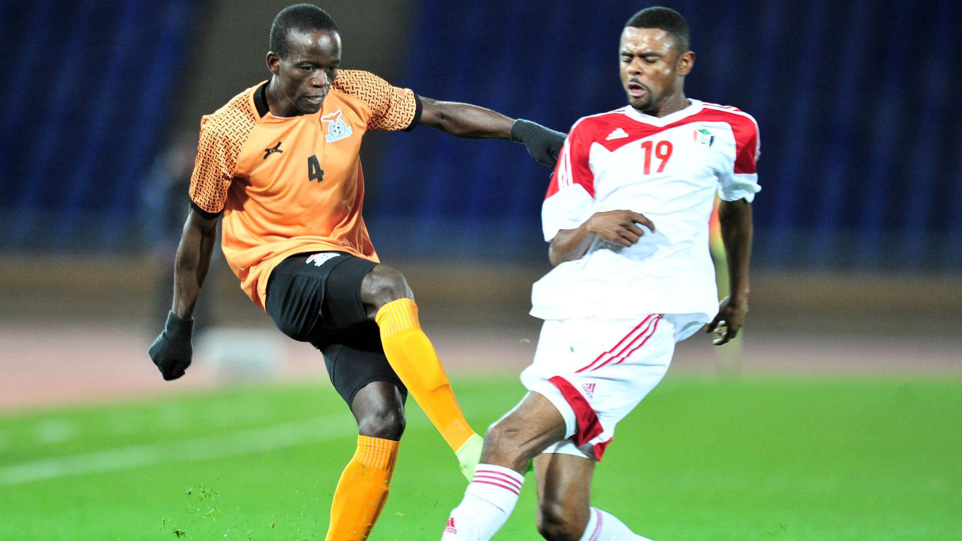 Adrian Chama of Zambia challenged by Mohamed Ahmed Bashir Bisha of Sudan.