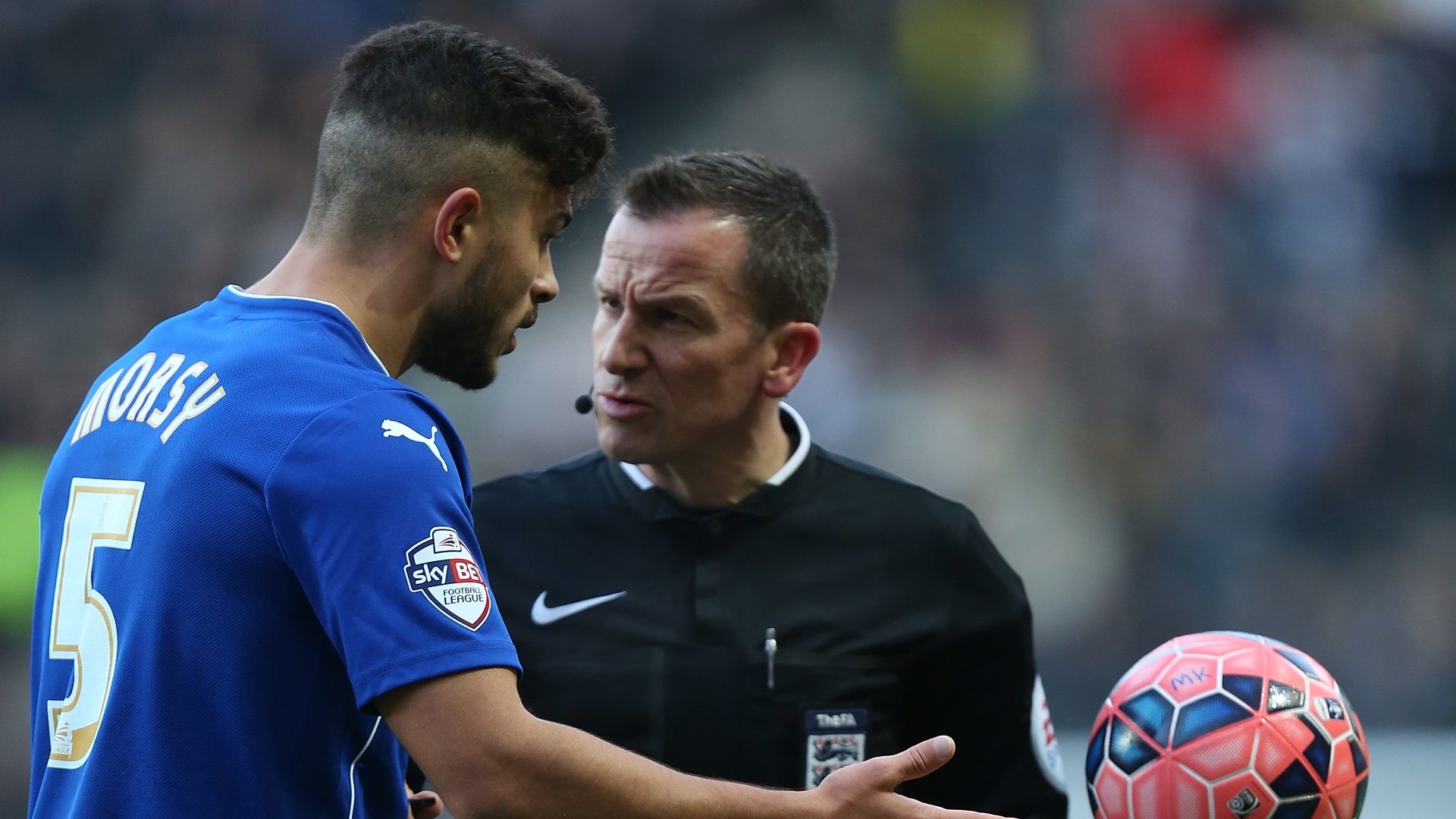 Sam Morsy of Wigan & referee Keith Stroud