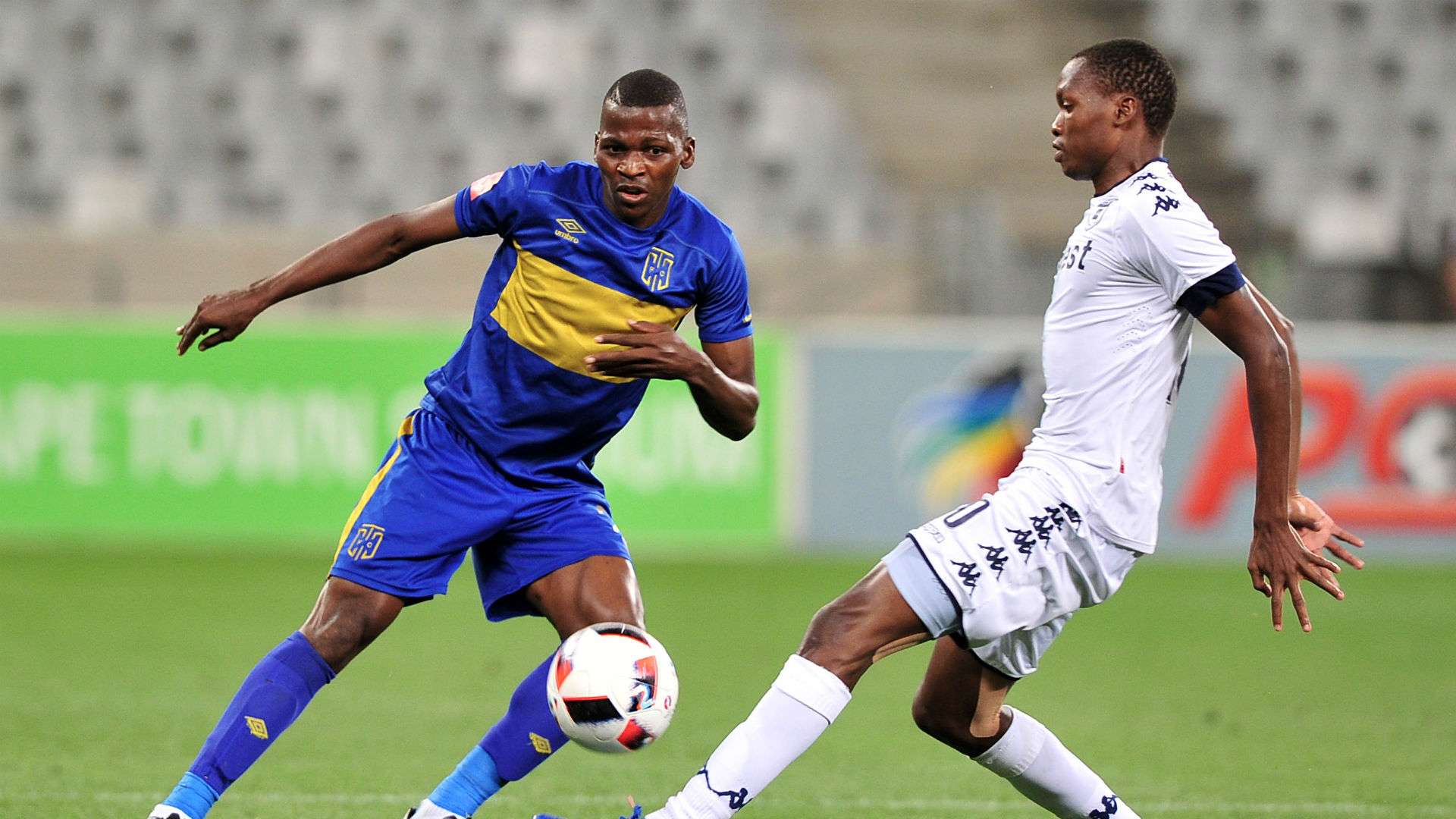 Thamsanqa Mkhize of Cape Town City FC evades challenge from Mokgakolodi Ngele of Bidvest Wits