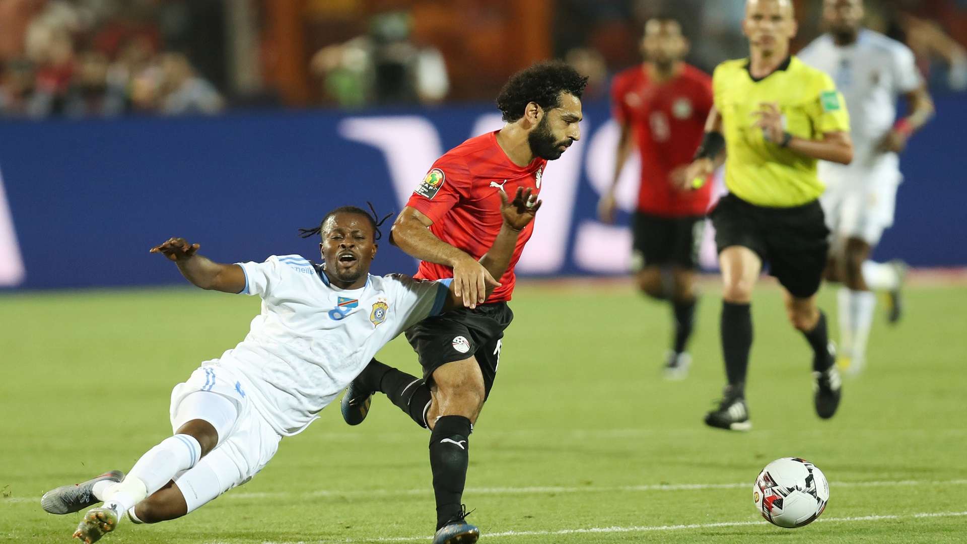 Tresor Mputu of DR Congo is challenged by Mohamed Salah of Egypt Africa Cup of Nations 2019