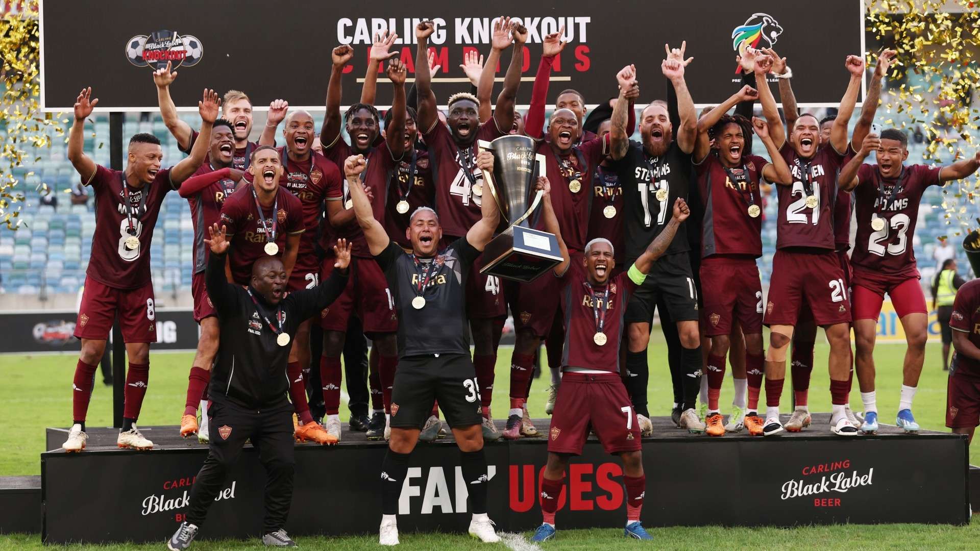 Stellenbosch FC celebrates lifting the trophy during the 2023 Carling Black Label Knockout match between Stellenbosch FC and TS Galaxy at Moses Mabhida Stadium, Durban on the 16 December 2023.
