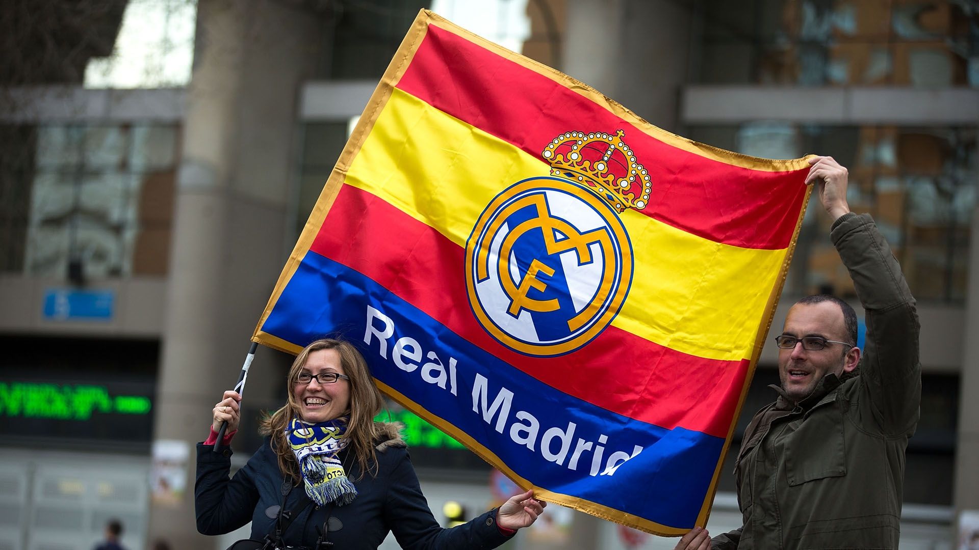 Real Madrid wave flags