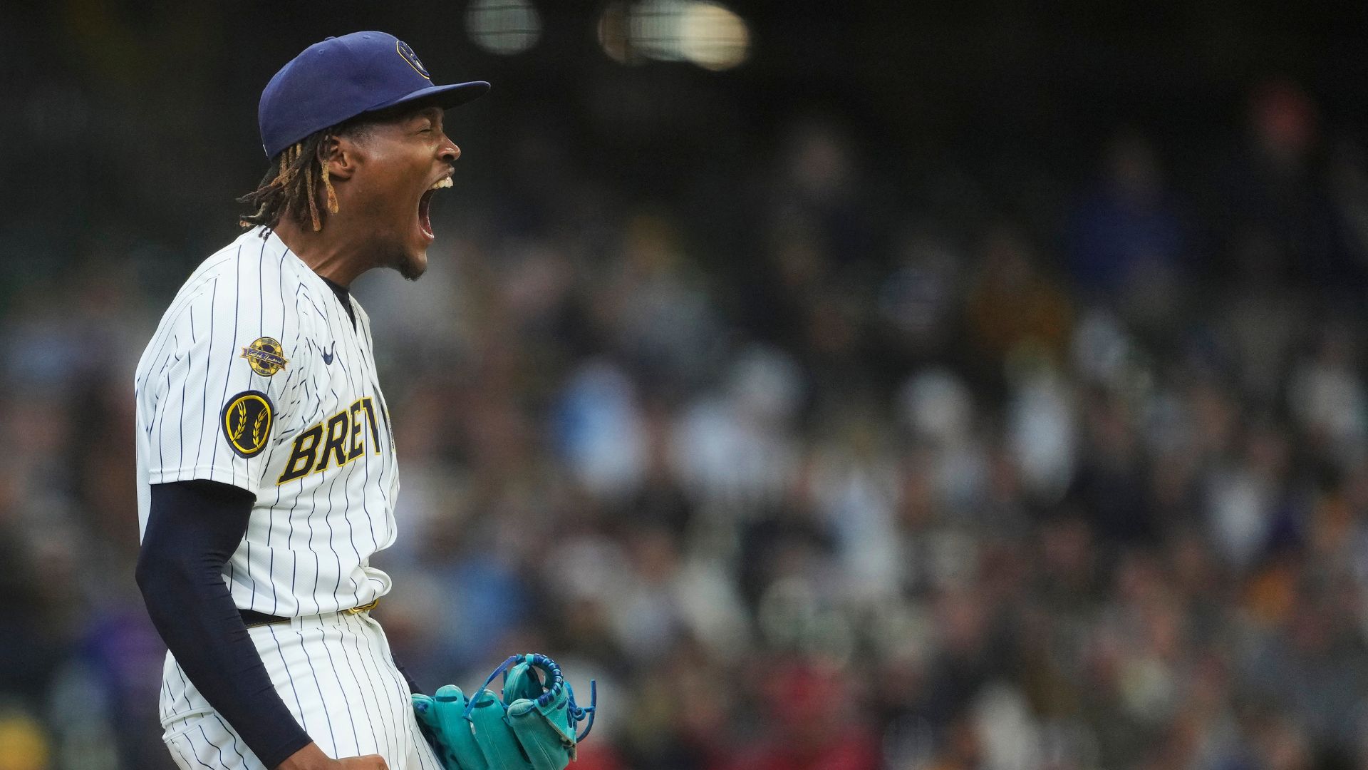 Abner Uribe #45 of the Milwaukee Brewers celebrates