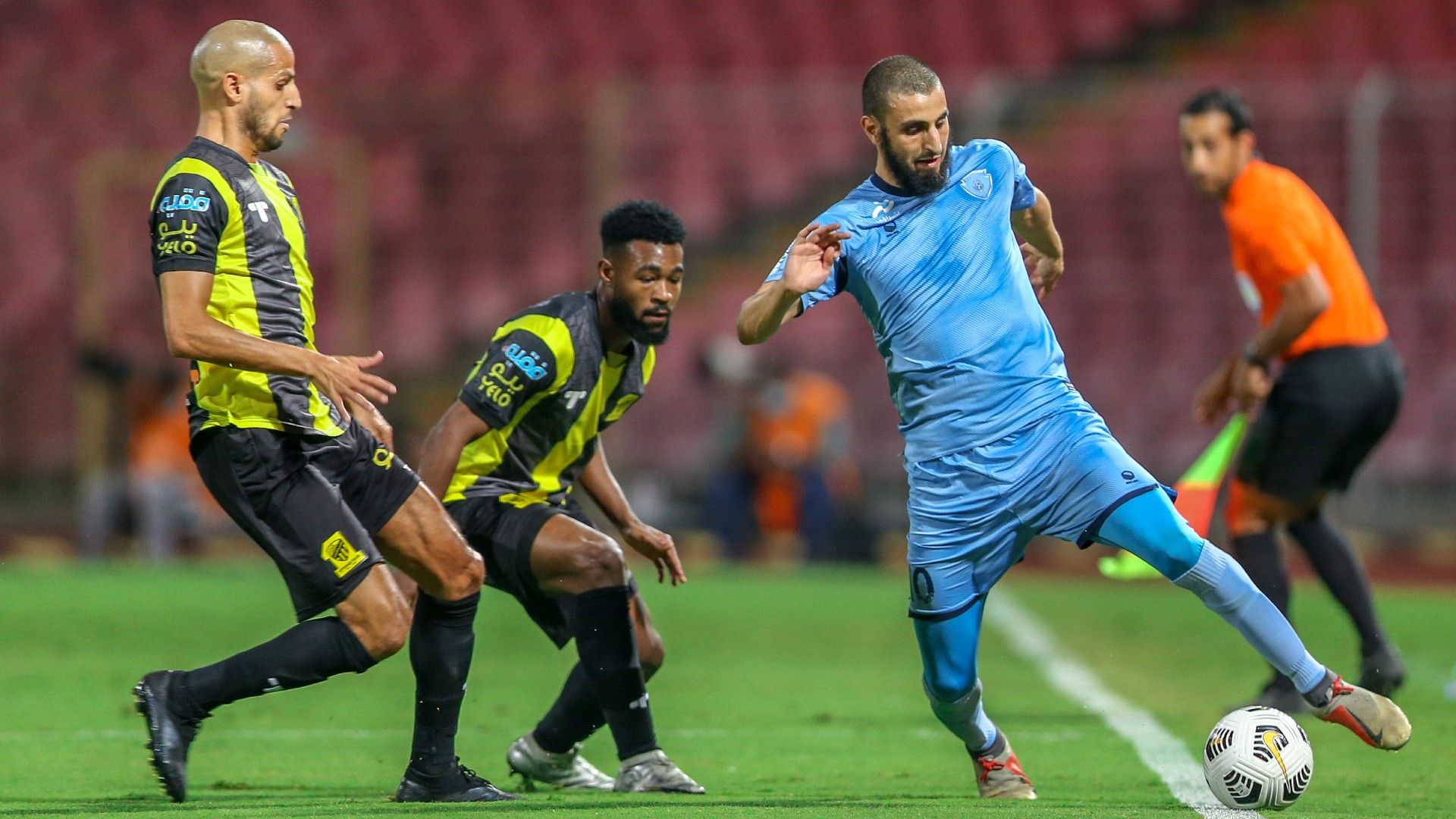 Muhannad Al-Shanqeeti (C) Karim El Ahmadi (L) Youssef El Jebli (R) Ittihad Batin SPL 16 April 2021