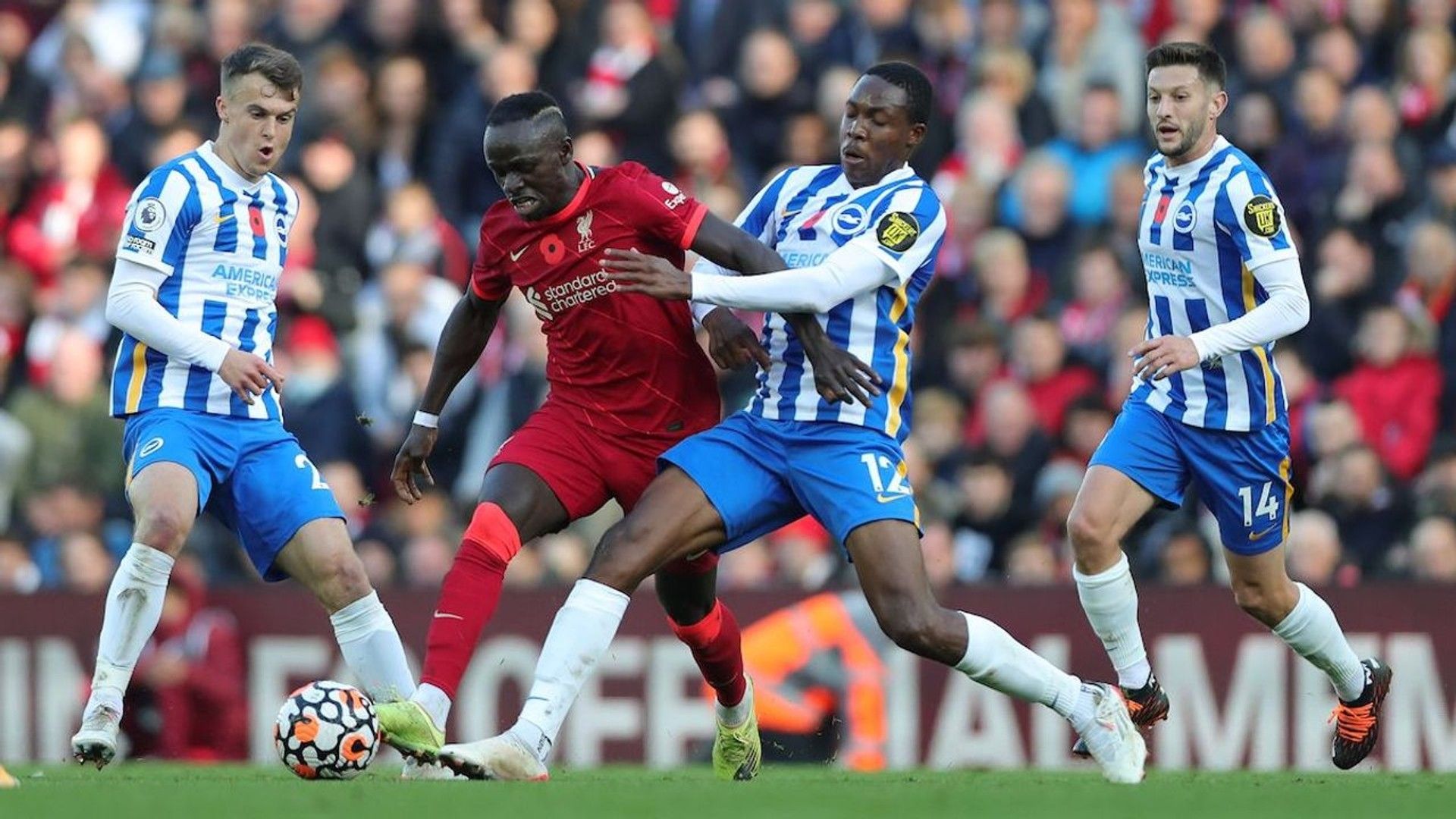 Brighton midfielder Enock Mwepu of Zambia vs Sadio Mane of Liverpool.