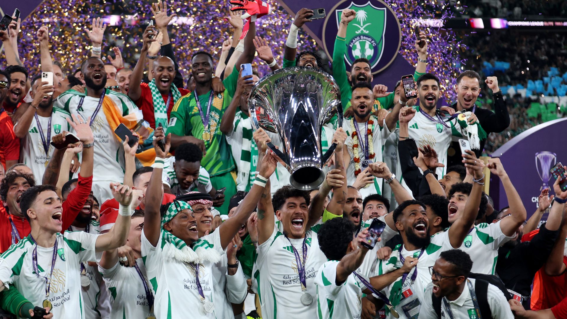 Roberto Firmino of Al-Ahli Saudi lifts The AFC Champions League Elite trophy