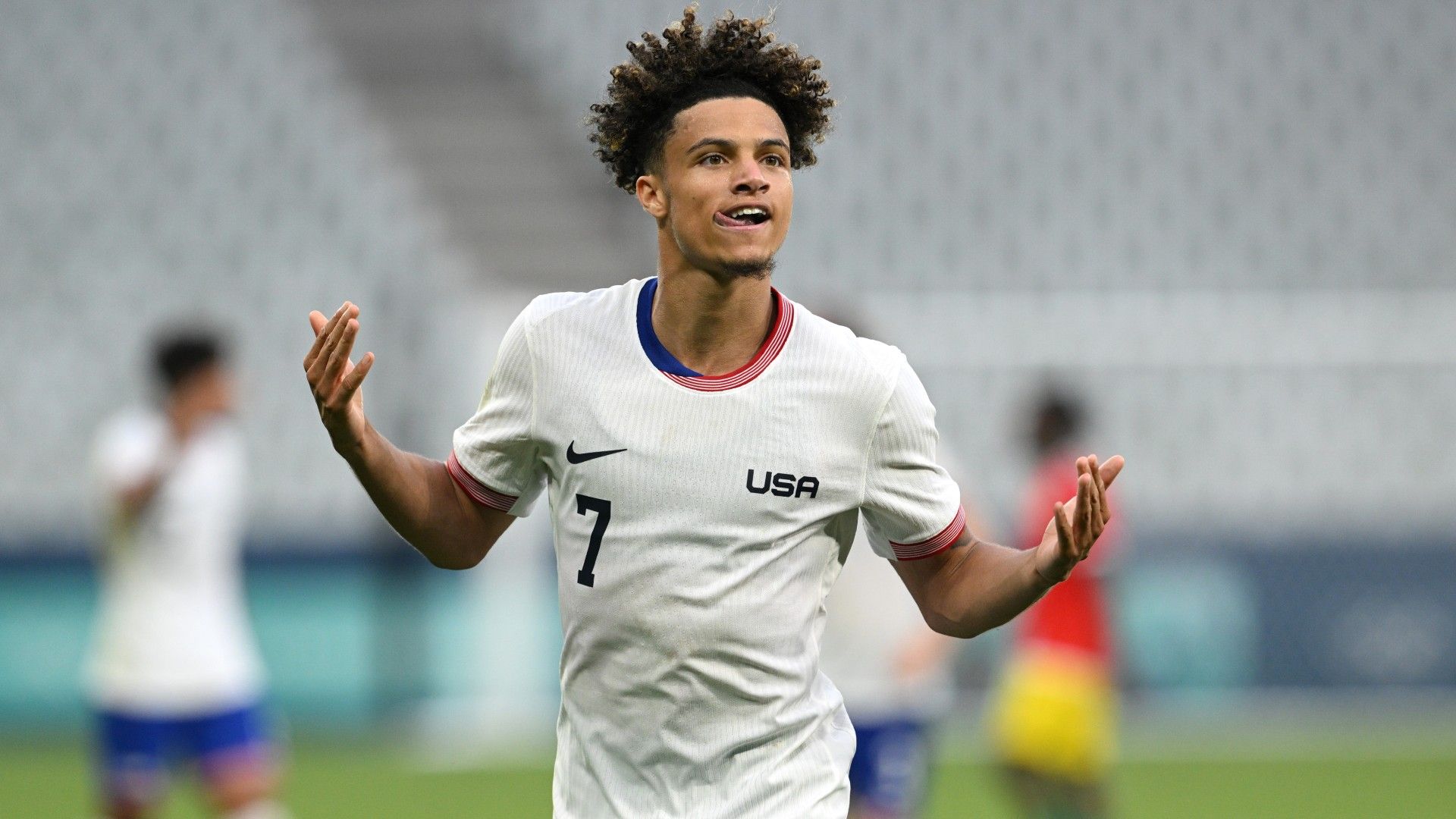 Kevin Paredes #7 of Team USA celebrates 