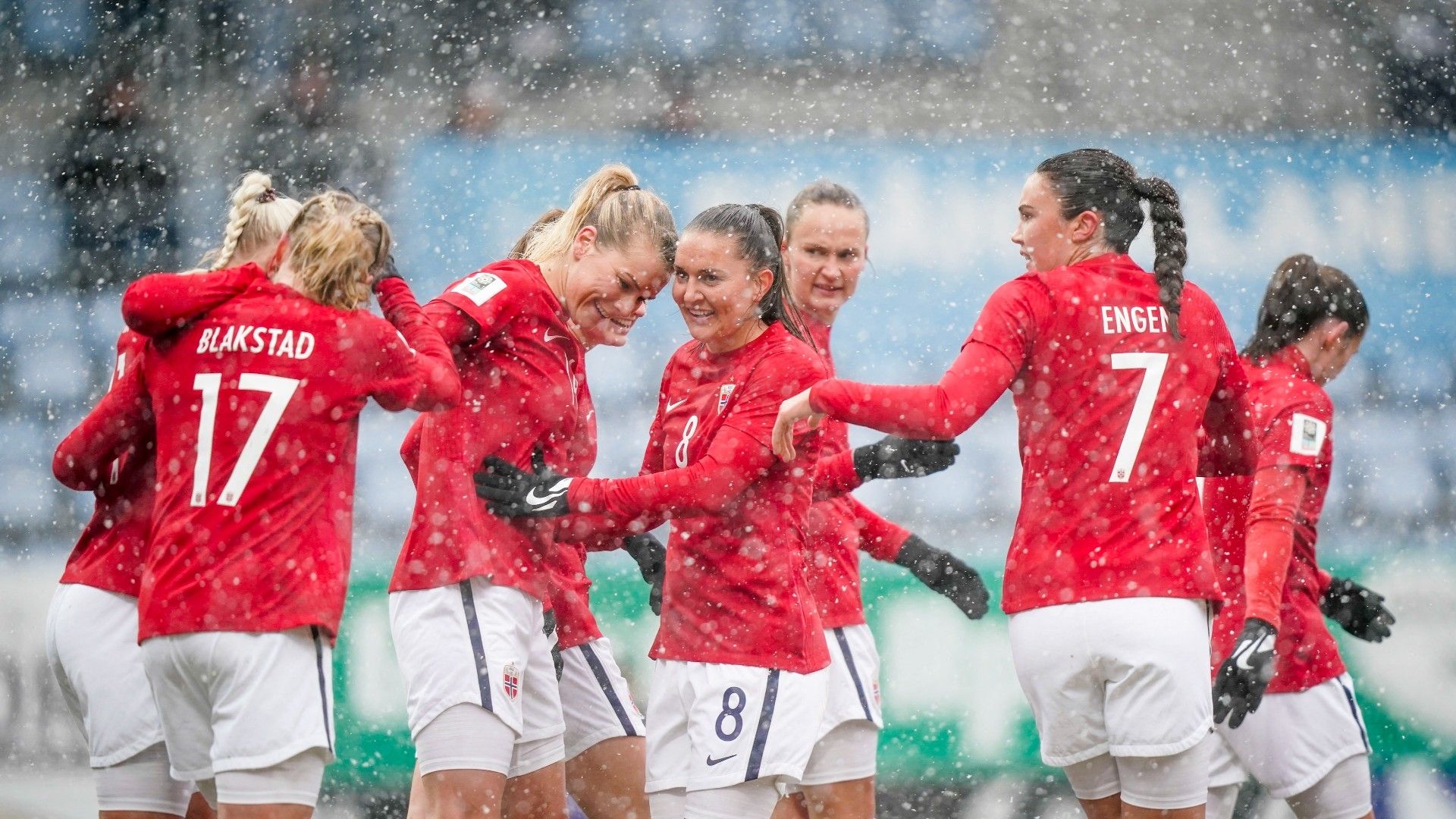 Norway's forward Ada Hegerberg (3rd L) celebrates scoring with her teammates her first goal for Norway
