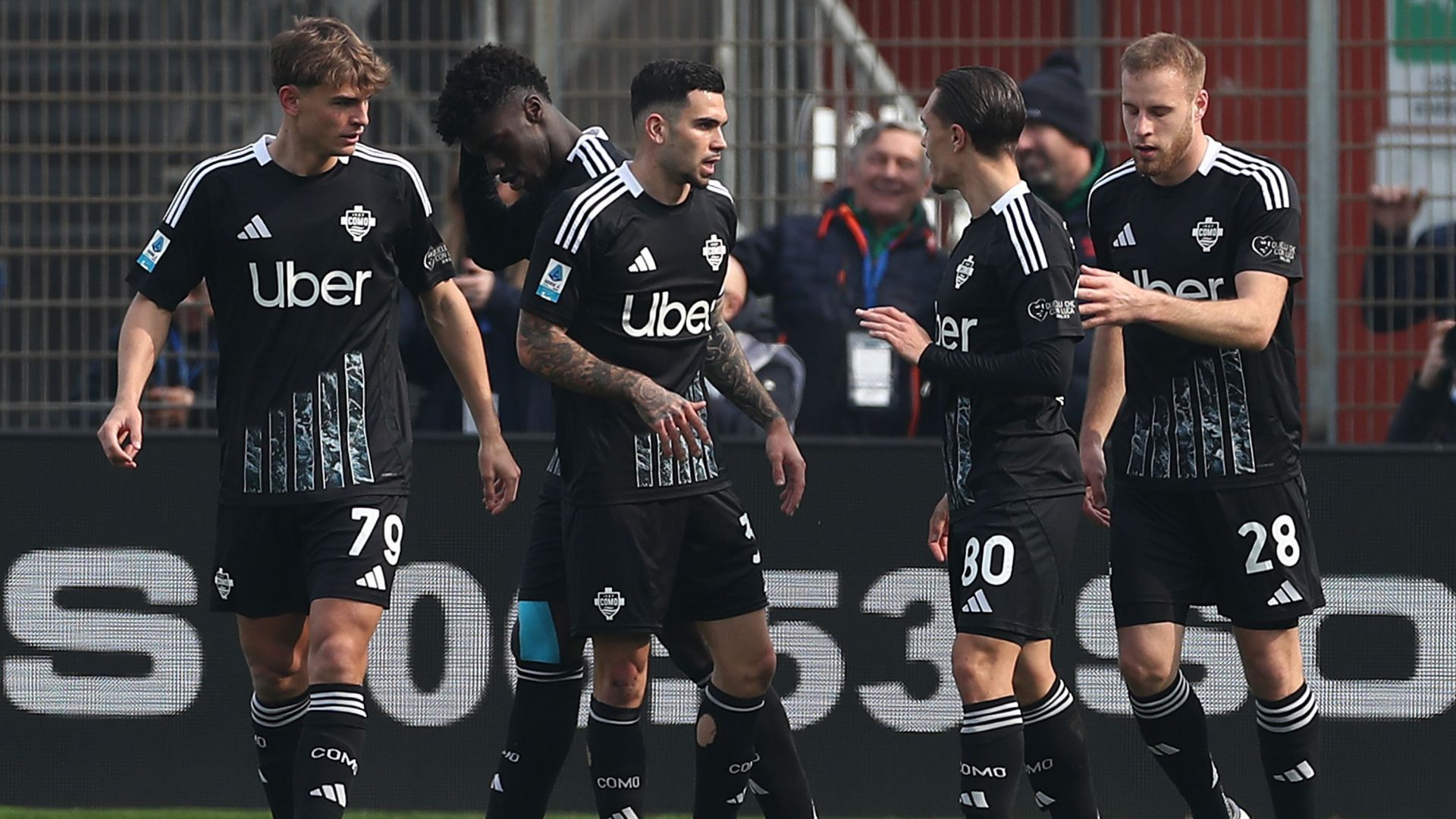 Como players celebrating Como Napoli Serie A