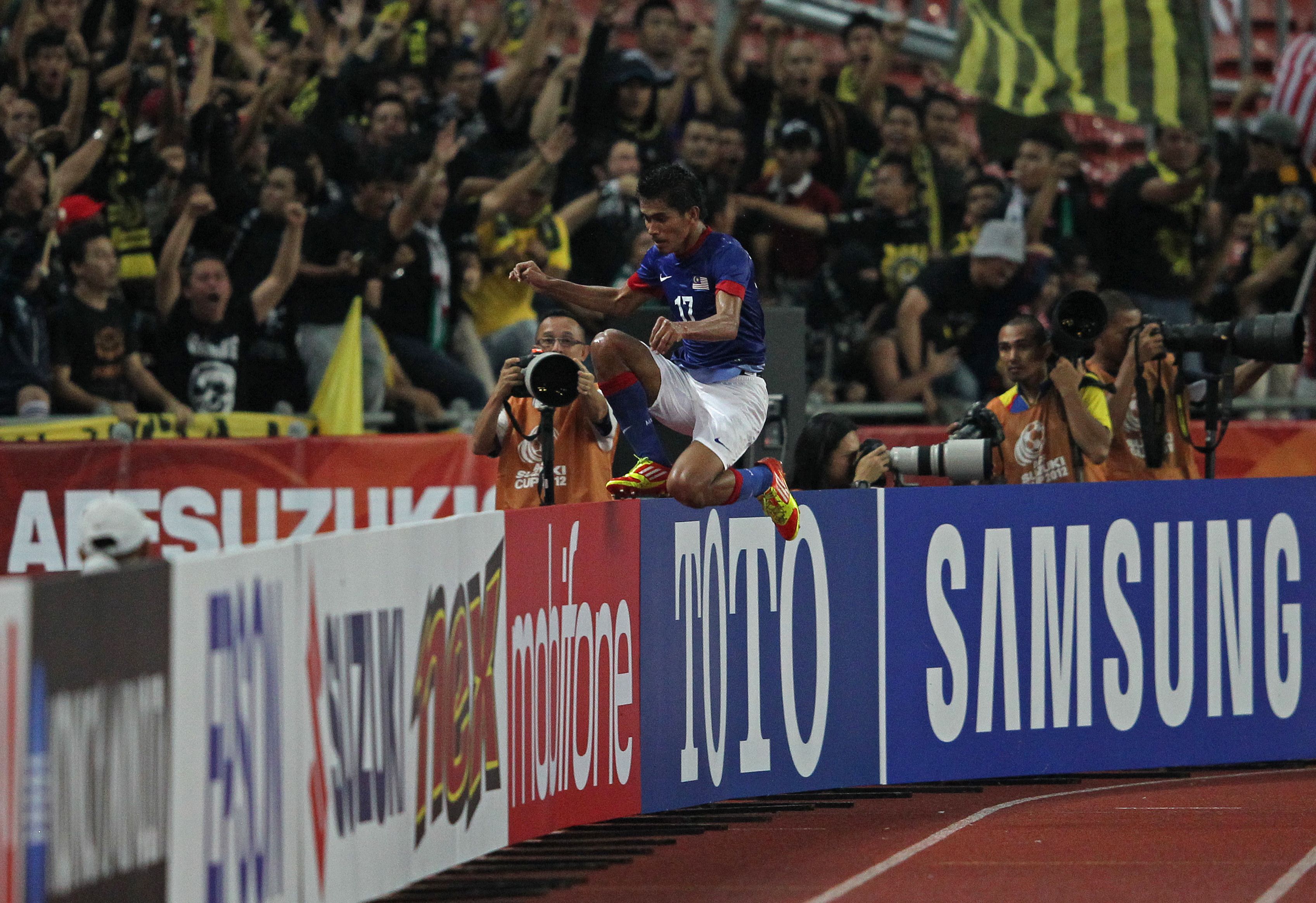 Malaysia's Azamuddin Akil celebrating his goal 2012