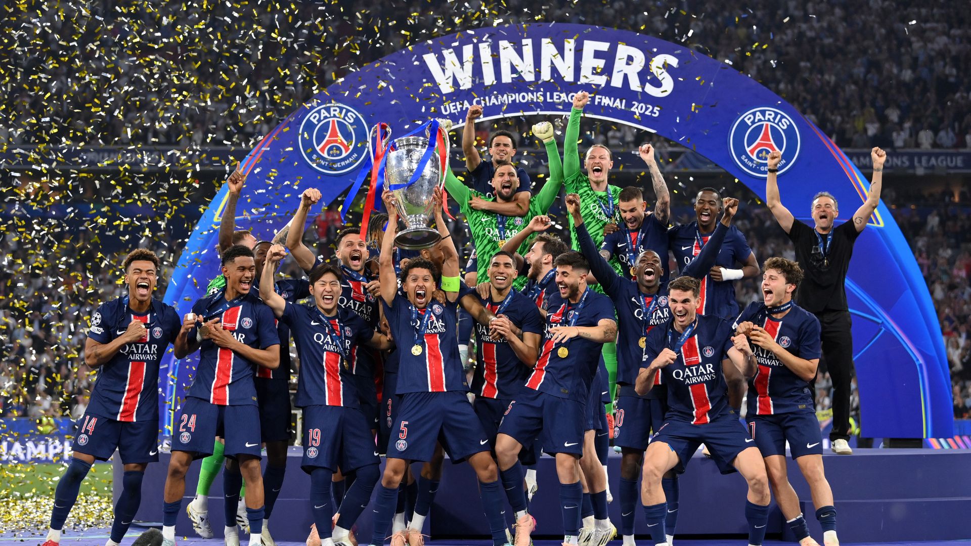 Marquinhos of Paris Saint-Germain lifts the UEFA Champions League trophy