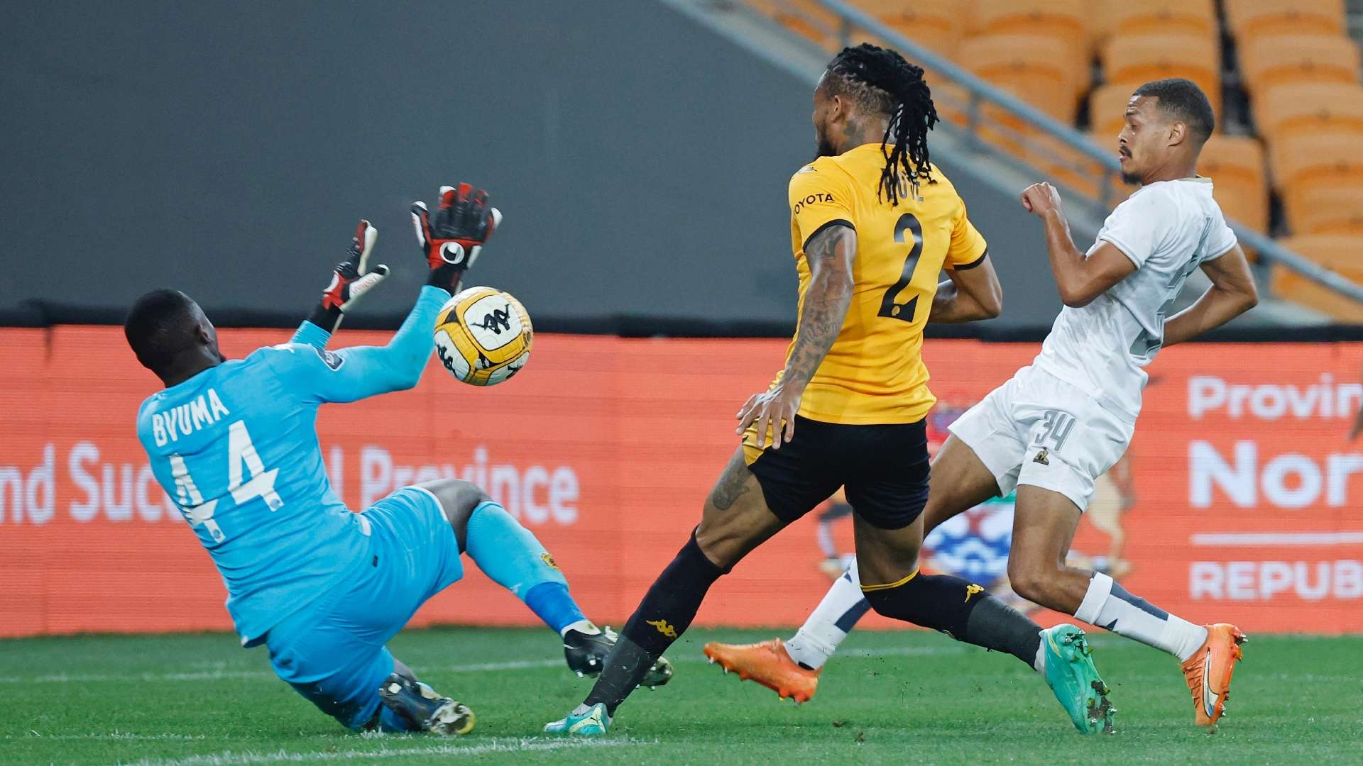 Devin Titus of Stellenbosch FC, Edmilson Dove and Bruce Bvuma of Kaizer Chiefs