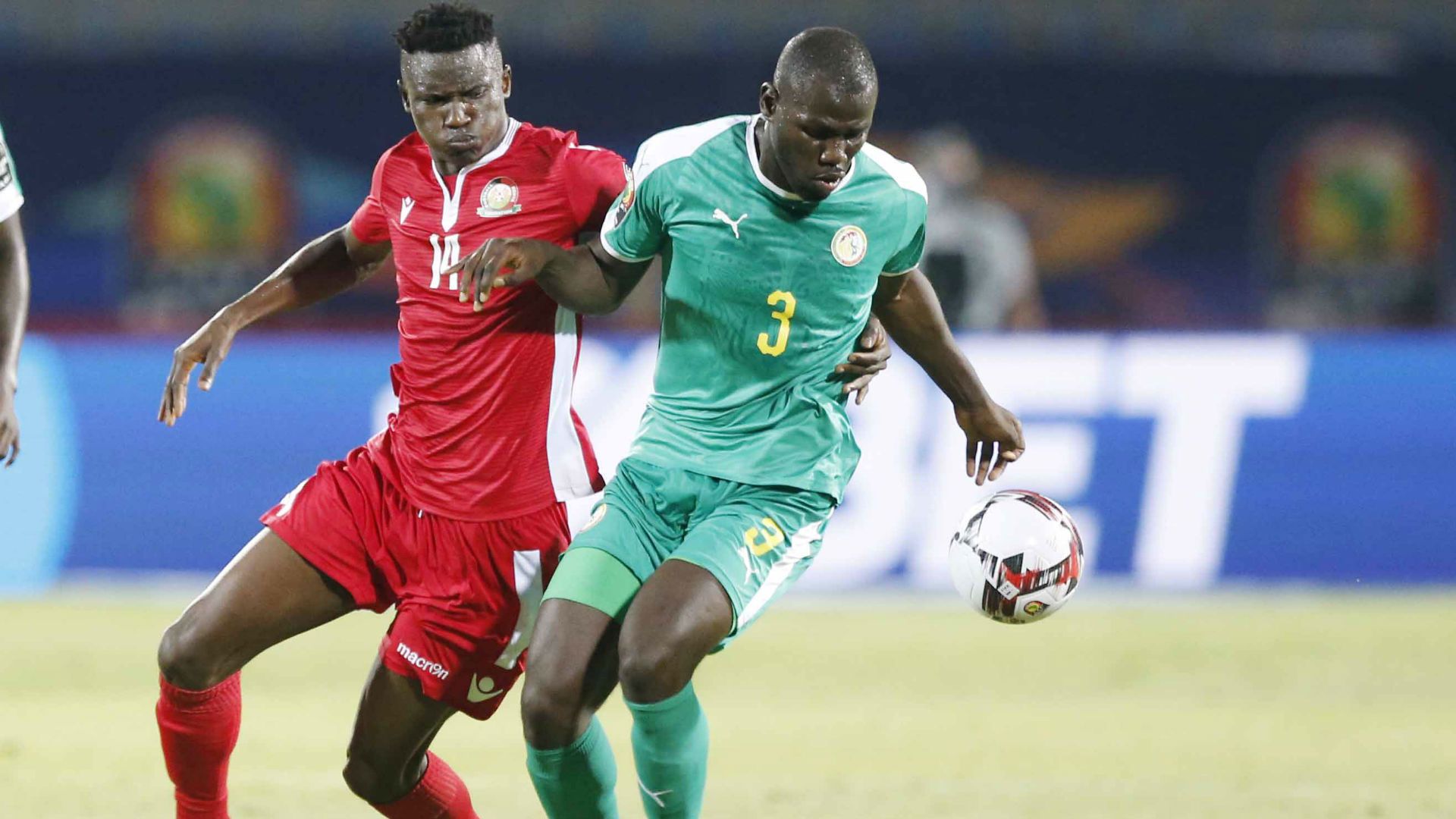 Michael OLUNGA of Kenya and Harambee Stars v KALIDOU KOULIBALY of Senegal.