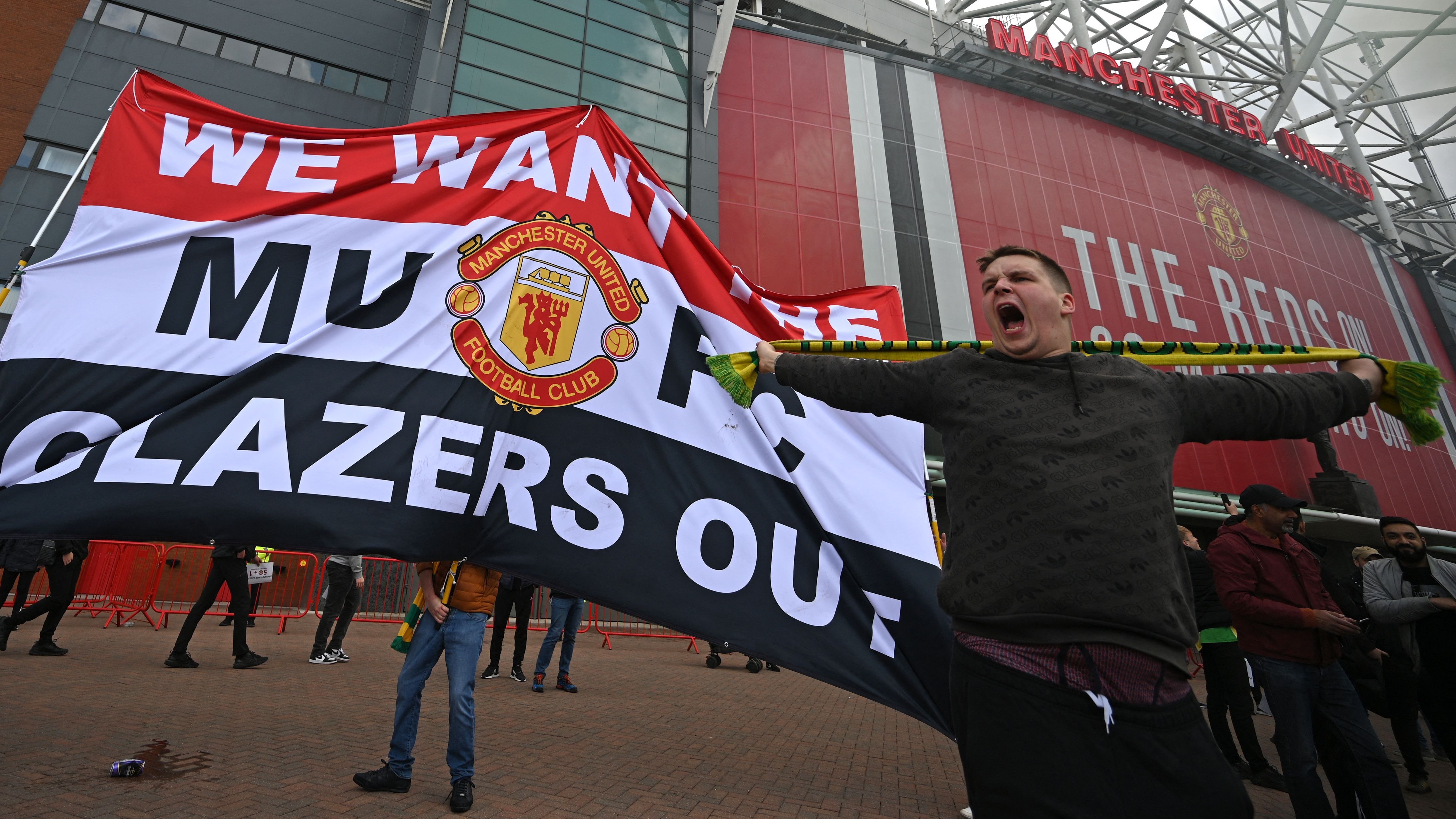 Man United fans protesting thier club owner at Old Traffrod