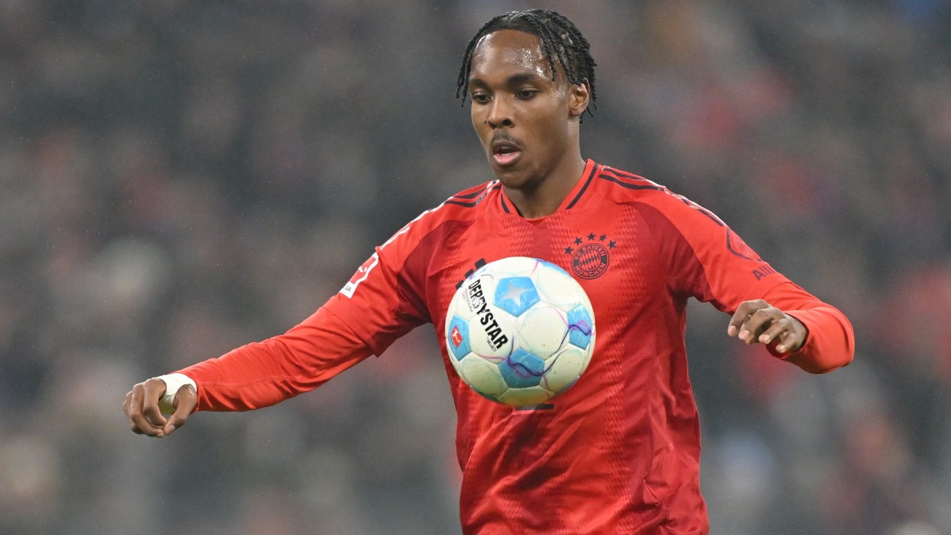 Mathys Tel of FC Bayern München plays the ball