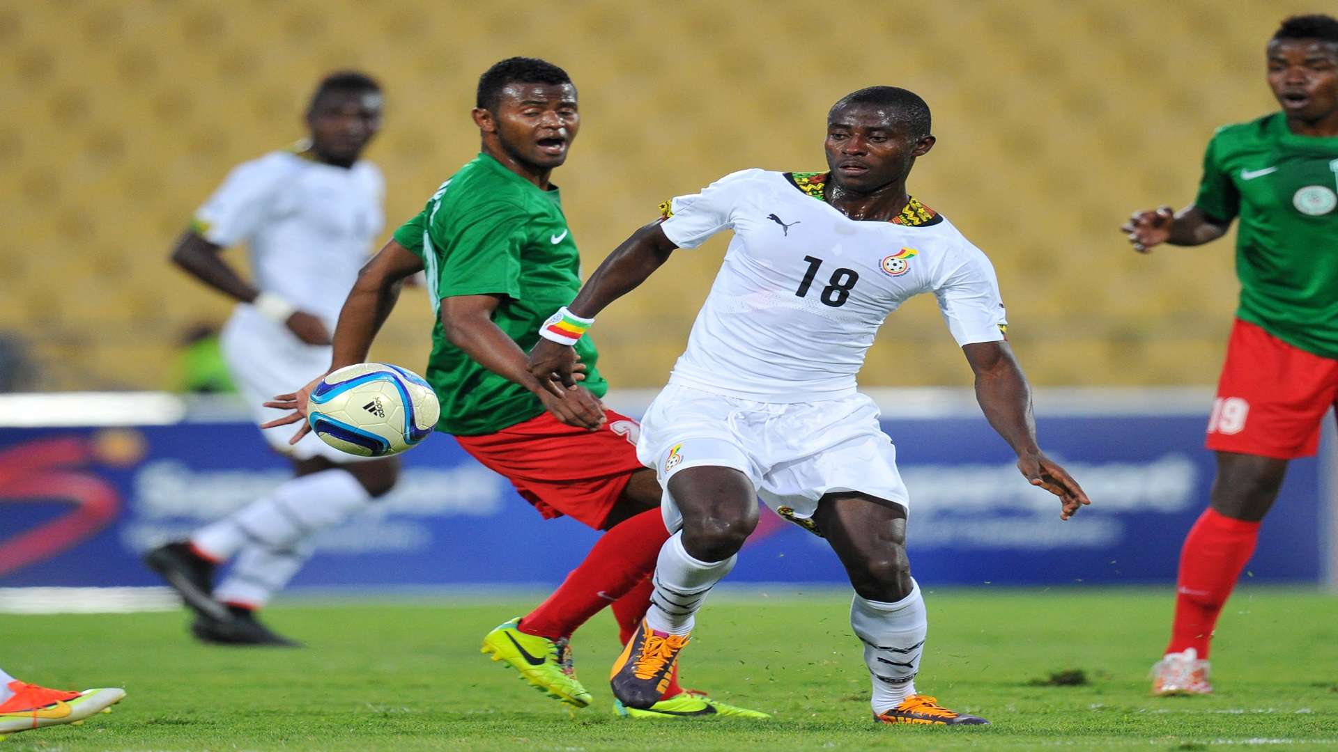 Adams Ahmed of Ghana challenged by Rihno Michel of Madagascar Cosafa Cup 25 May 2015