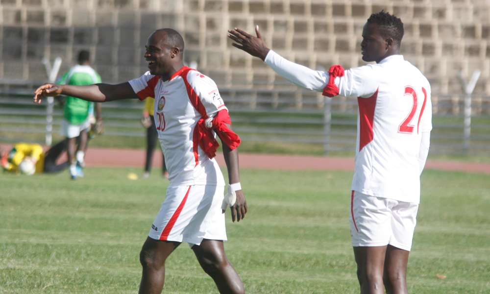 Kenya striker Denis Oliech and Macdonald Mariga