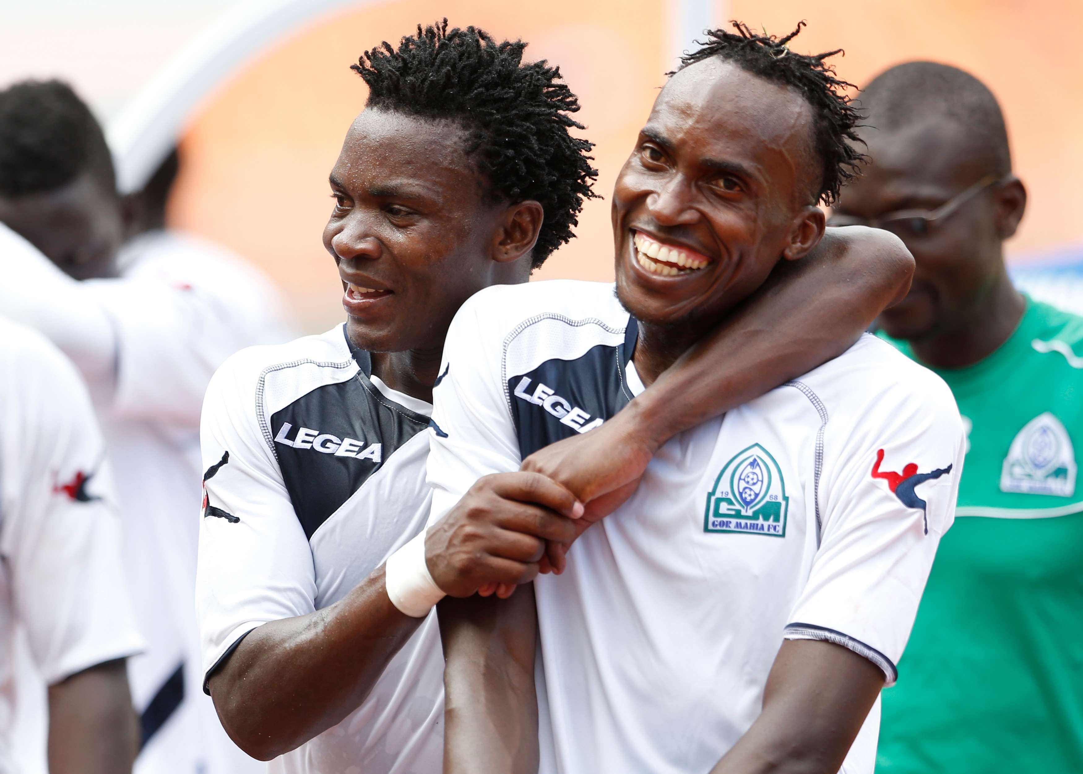 George Odhiambo and teammate Karim Nizigiyimana of Gor Mahia celebrate