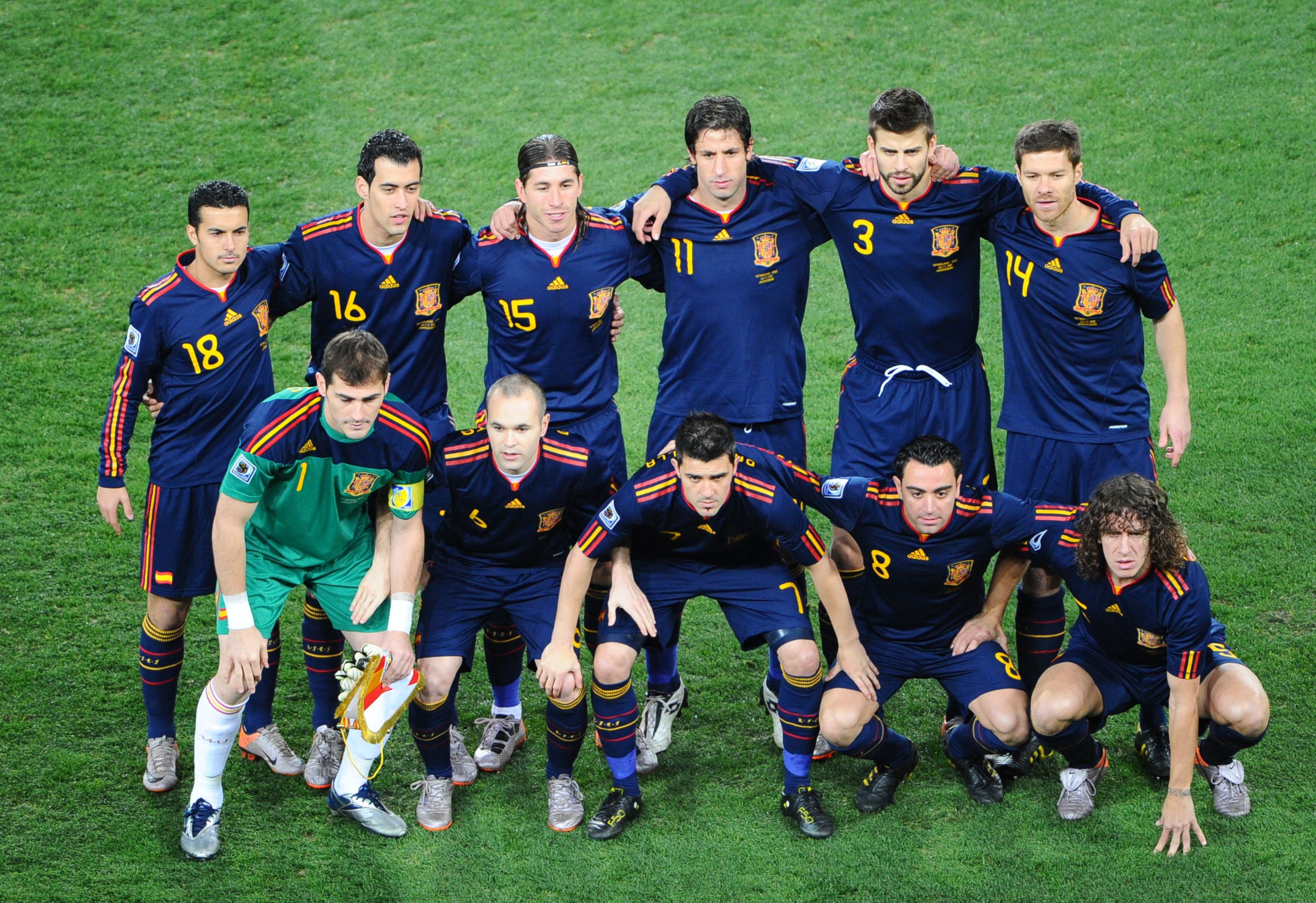 Pedro, Spain's midfielder Sergio Busquets, Spain's defender Sergio Ramos, Spain's defender Joan Capdevila, Spain's defender Gerard Pique, Spain's midfielder Xabi Alonso; (bottom from L) Spain's goalkeeper Iker Casillas, Spain's midfielder Andrés Iniesta, Spain's striker David Villa, Spain's midfielder Xavi, Spain's defender Carles Puyol 