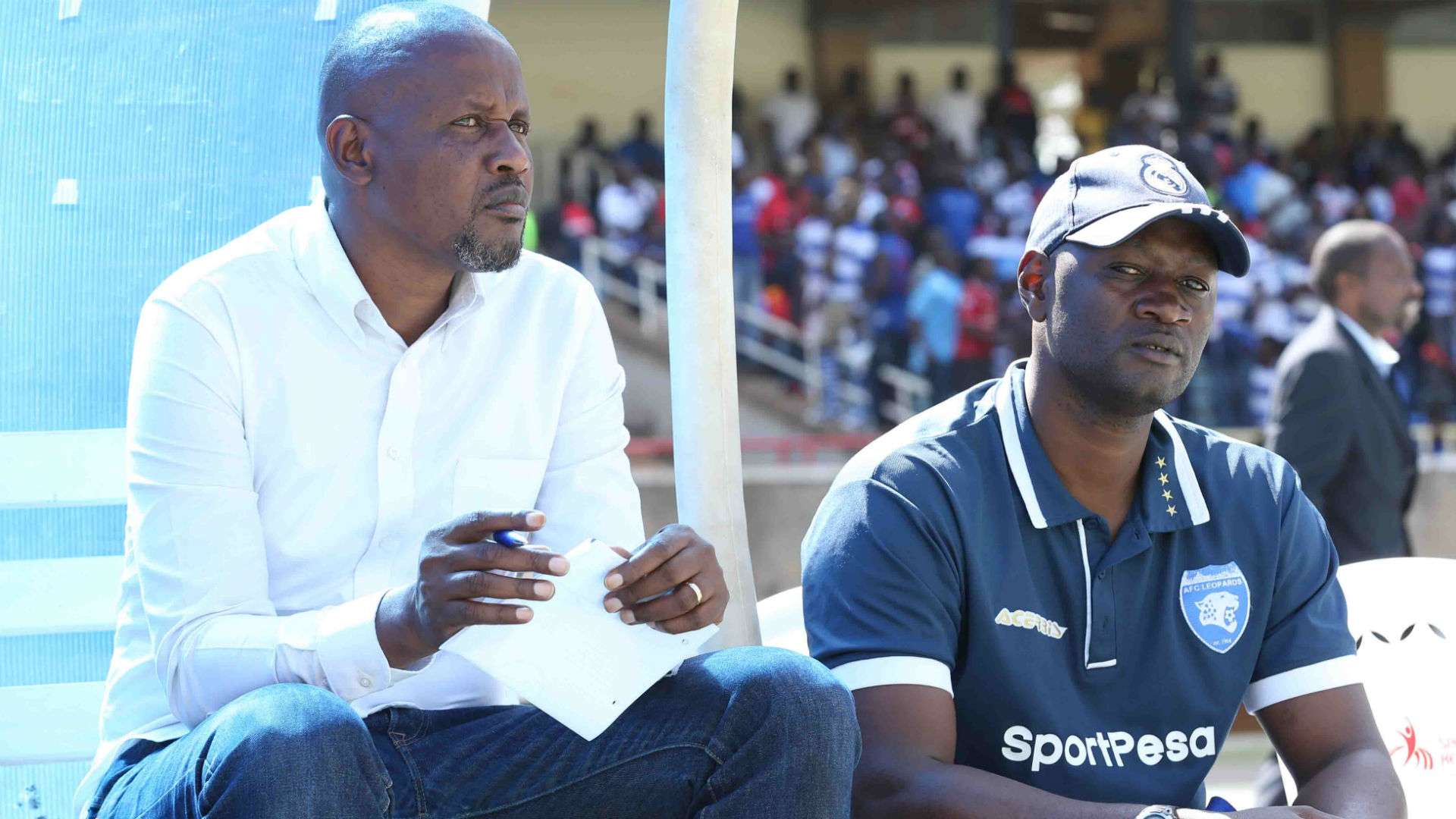 AFC Leopards coach Casa Mbungo and Lawrence Webo.