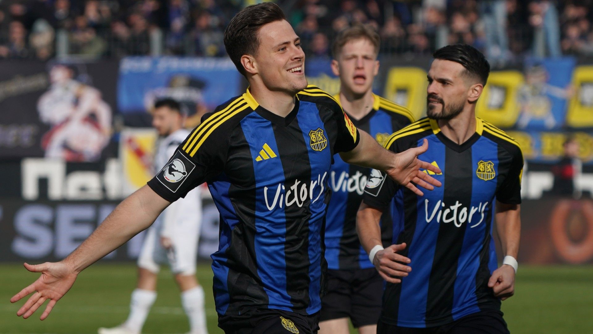 Stefan Feiertag of 1. FC Saarbruecken celebrate 