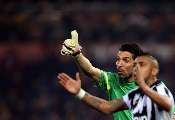 Gianluigi Buffon y Arturo Vidal.