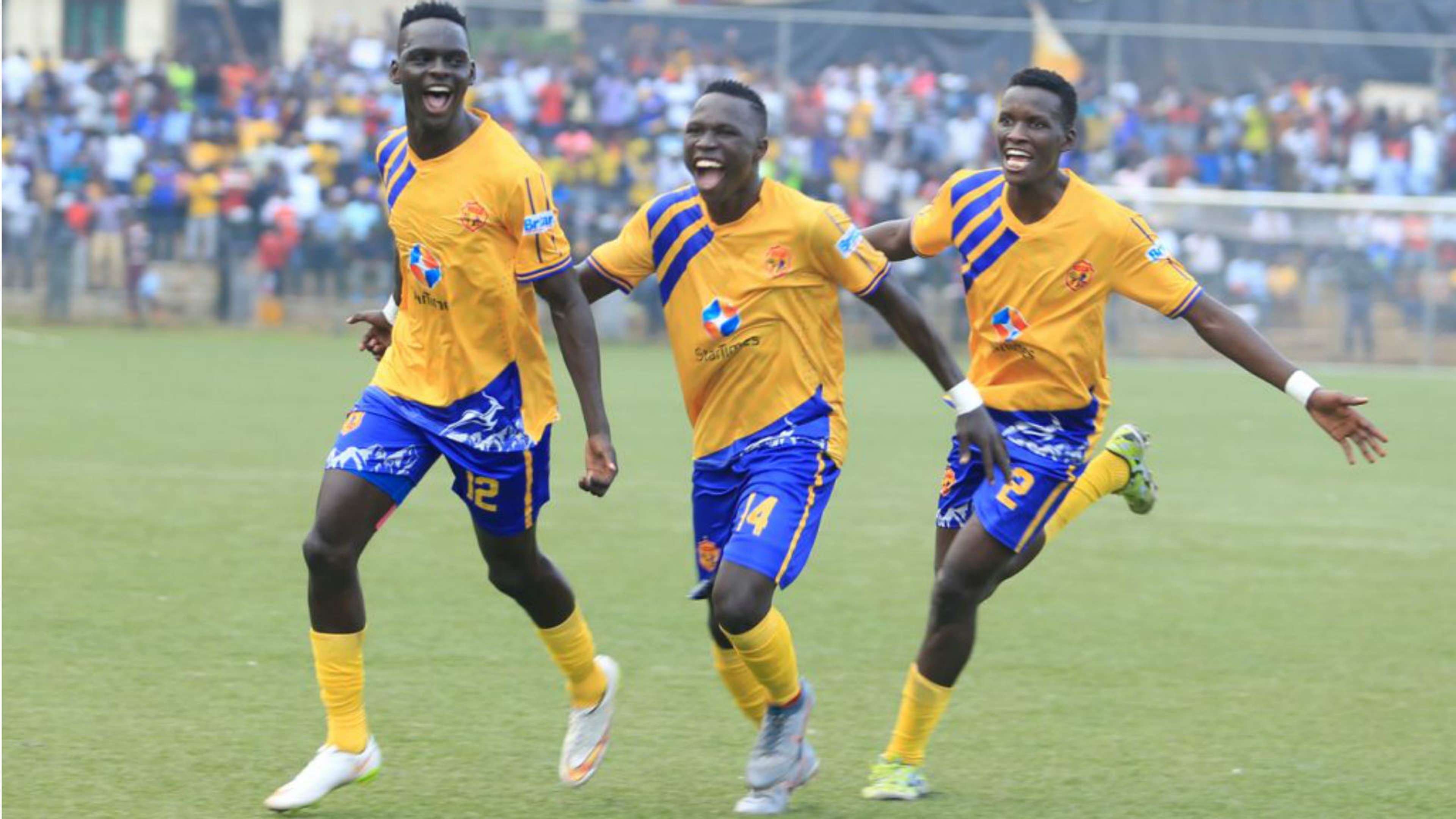 Martin Kizza Anaku and Kato celebrate the opener for KCCA FC against African Stars at Lugogo.
