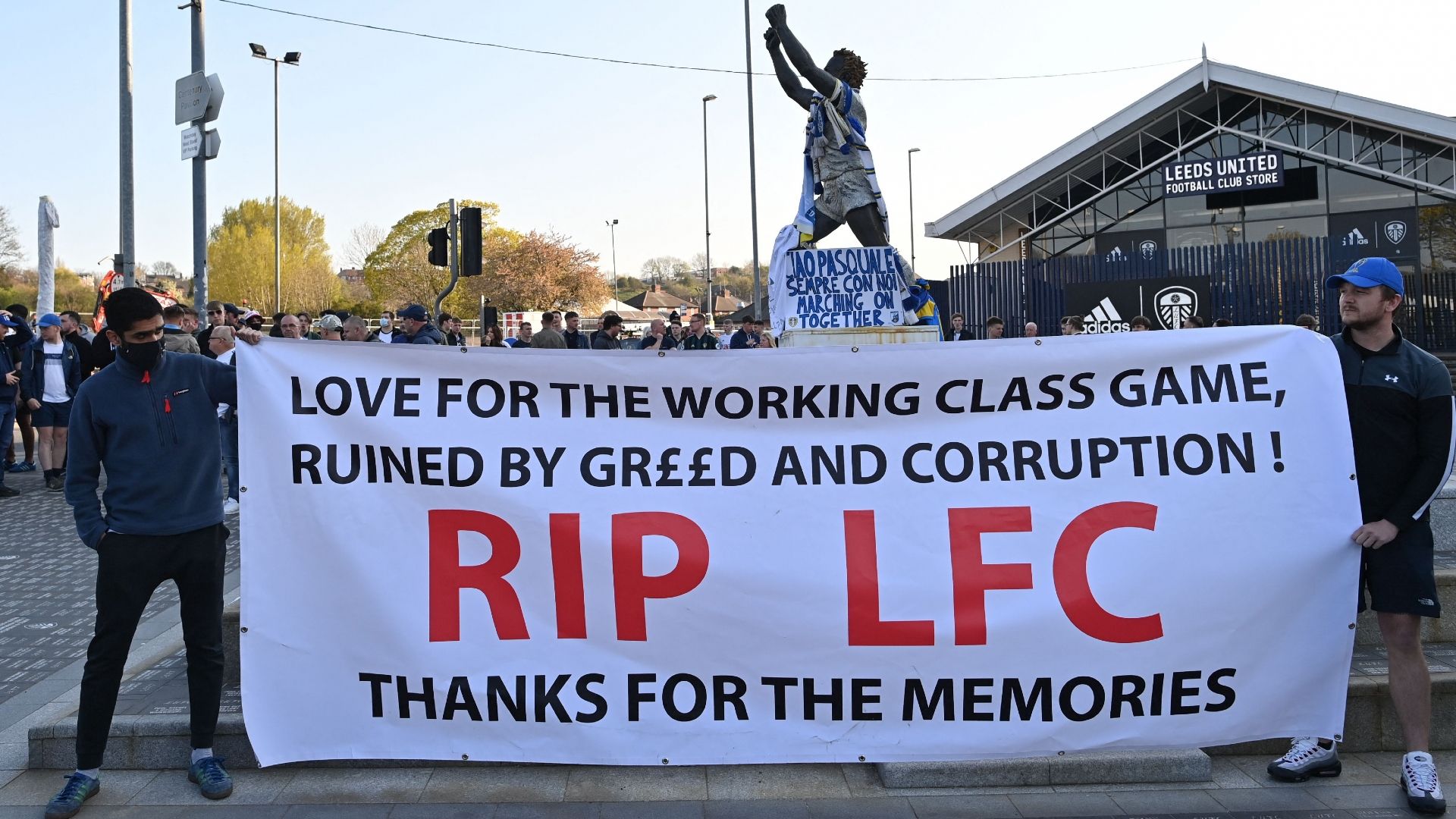 Fans unveil banner before Leeds v Liverpool at Elland Road April 2021
