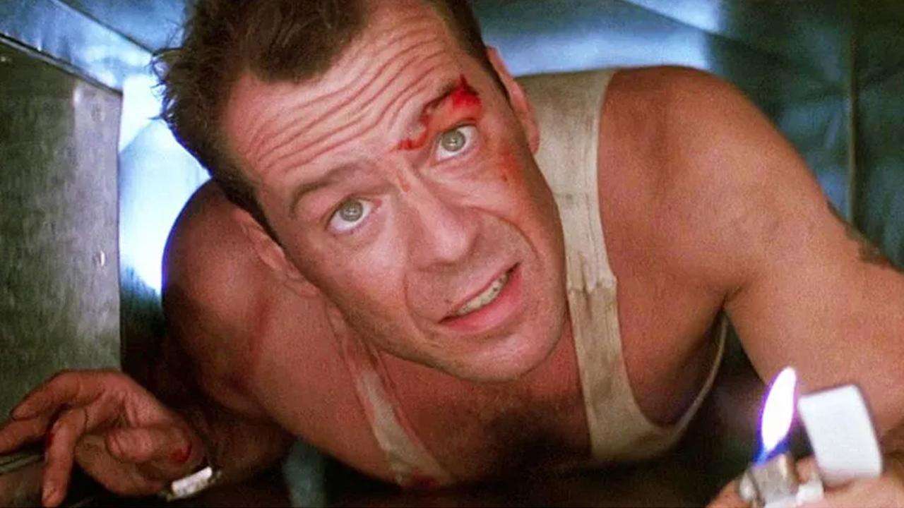 Bruce Willis as John McClane, in Die Hard.