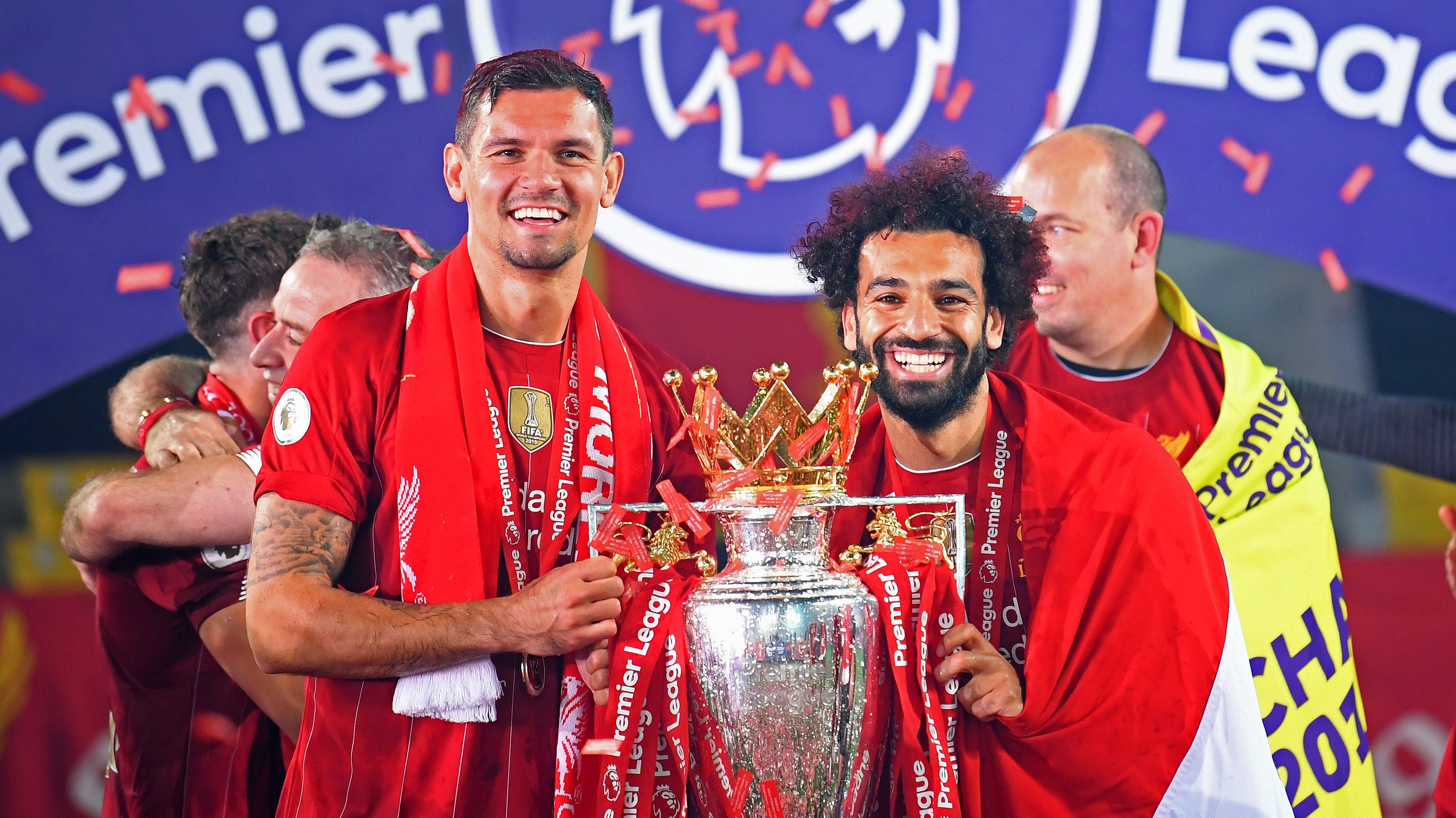 Liverpool lifts The Premier League trophy following the Premier League match between Liverpool FC and Chelsea FC at Anfield on July 22, 2020