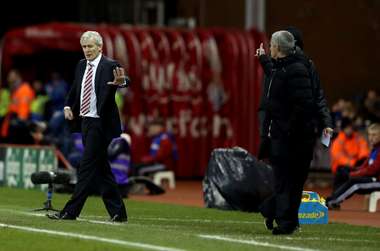 Stoke City boss Mark Hughes and Chelsea manager Jose Mourinho