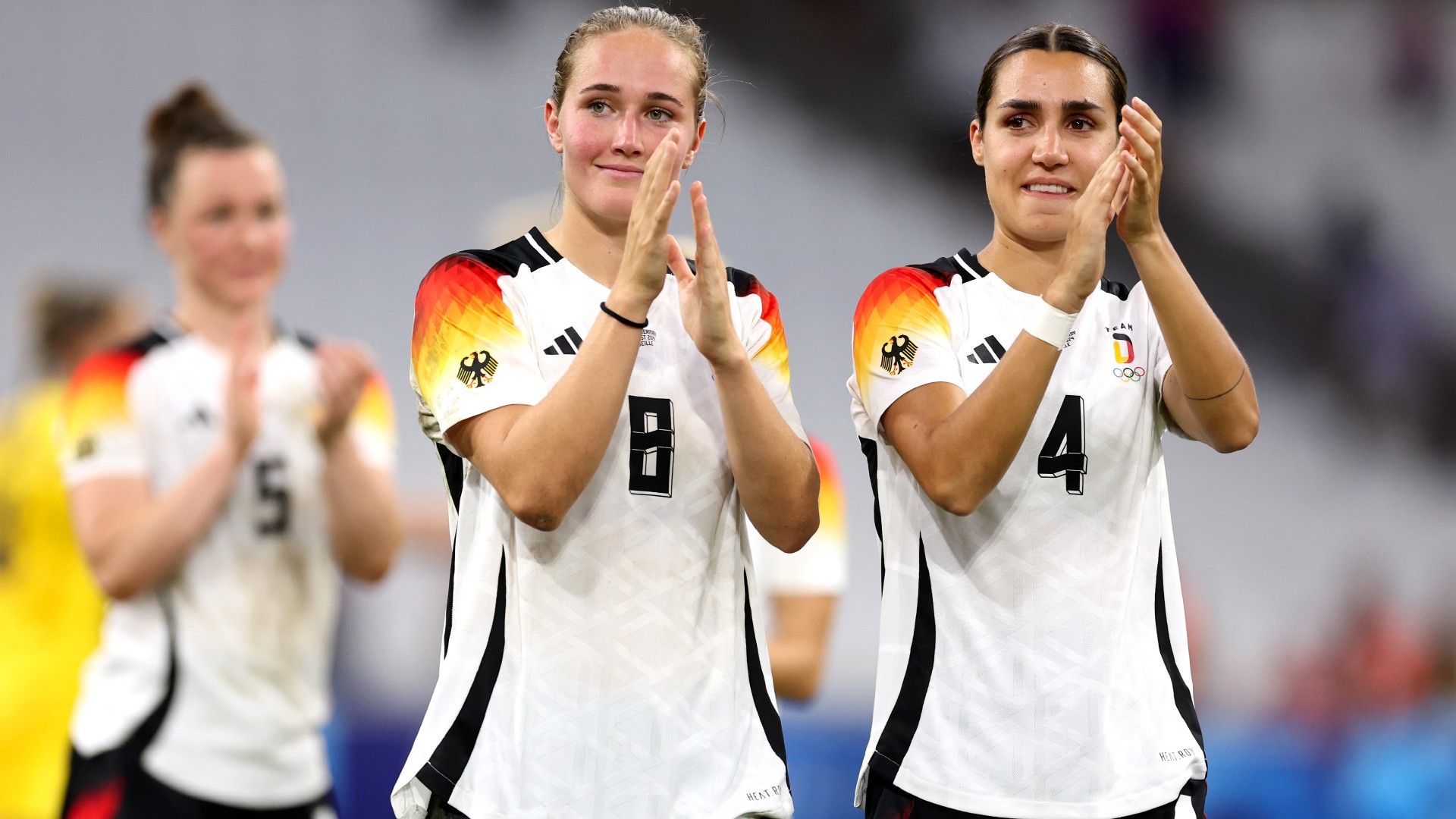 Sydney Lohmann #8 and Bibiane Schulze Solano #4 of Team Germany celebrates 
