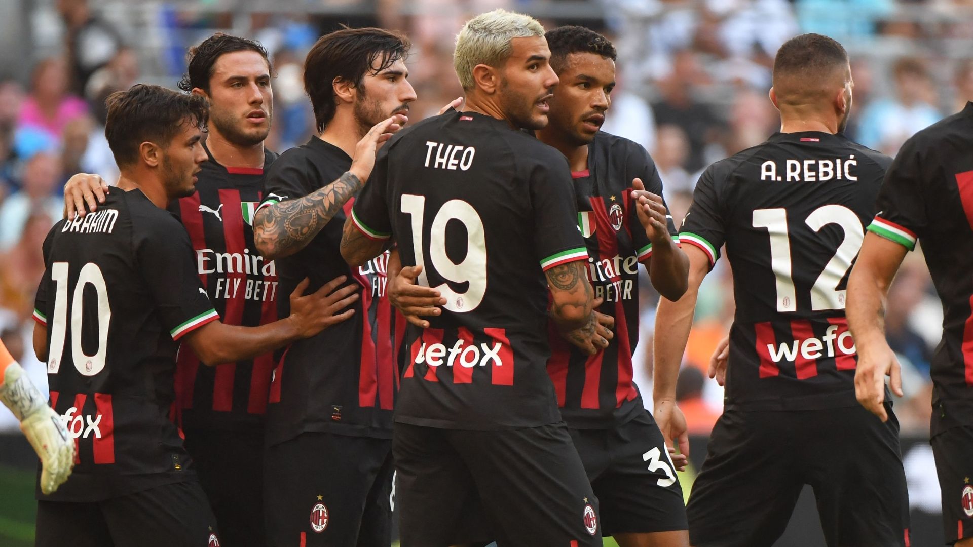 Milan celebrating