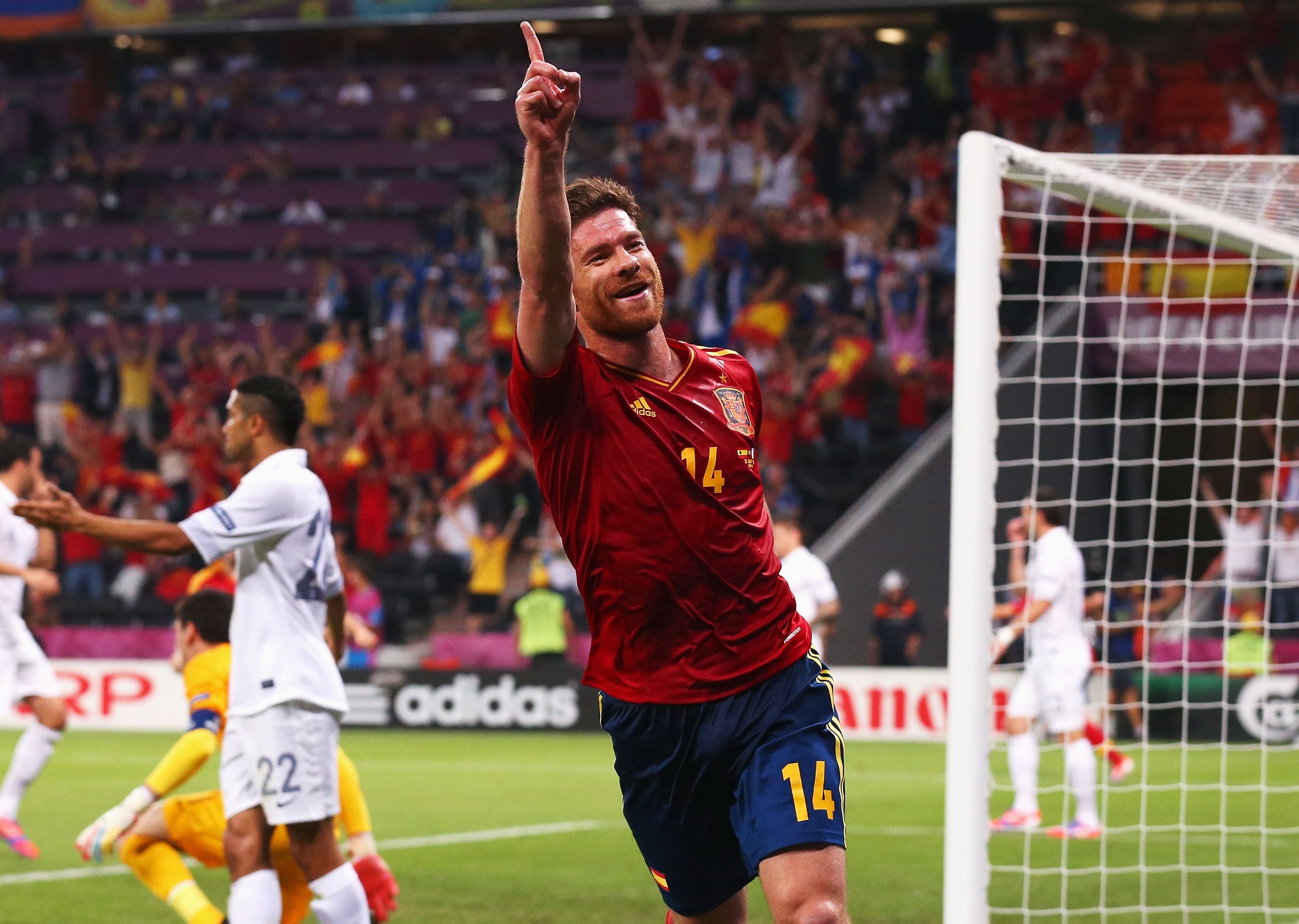 Spain midfielder Xabi Alonso celebrates