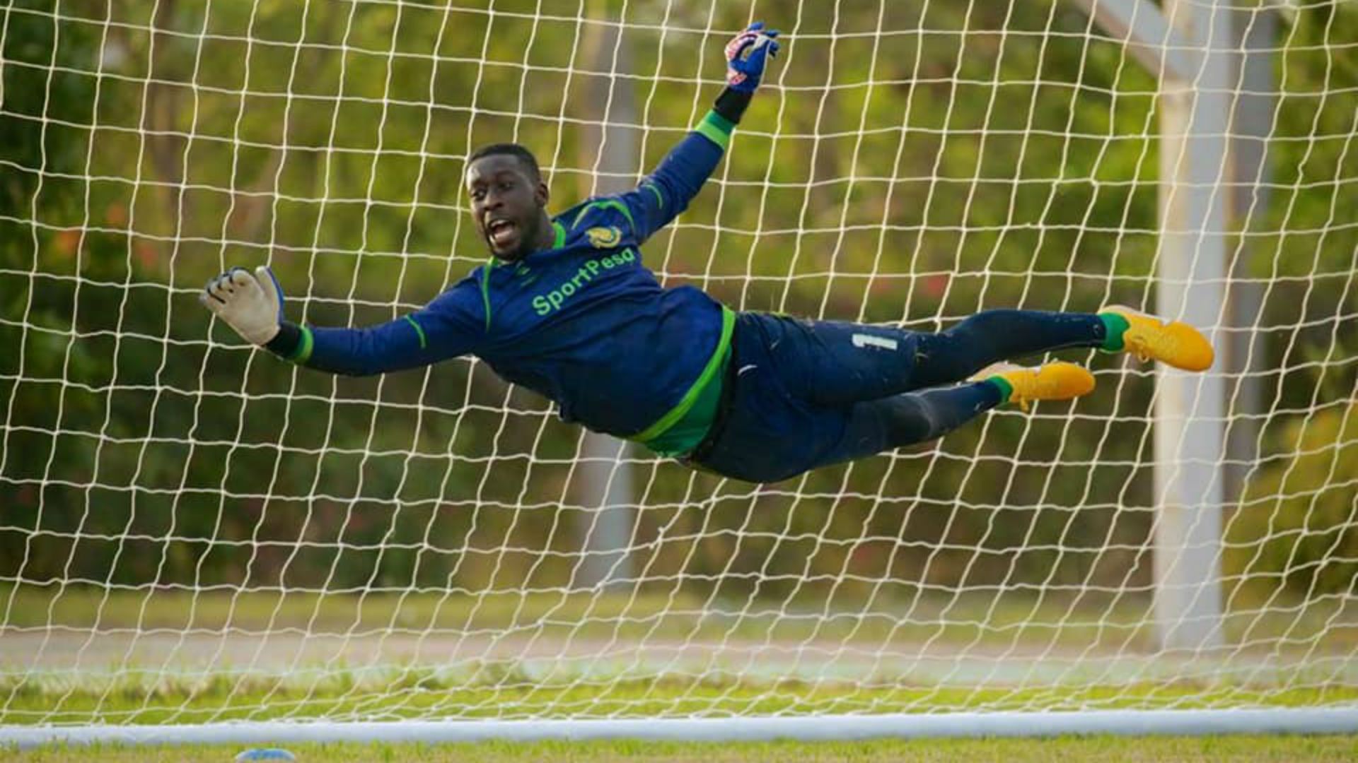 Yanga SC keeper Farouk Shikhalo and Kenya.