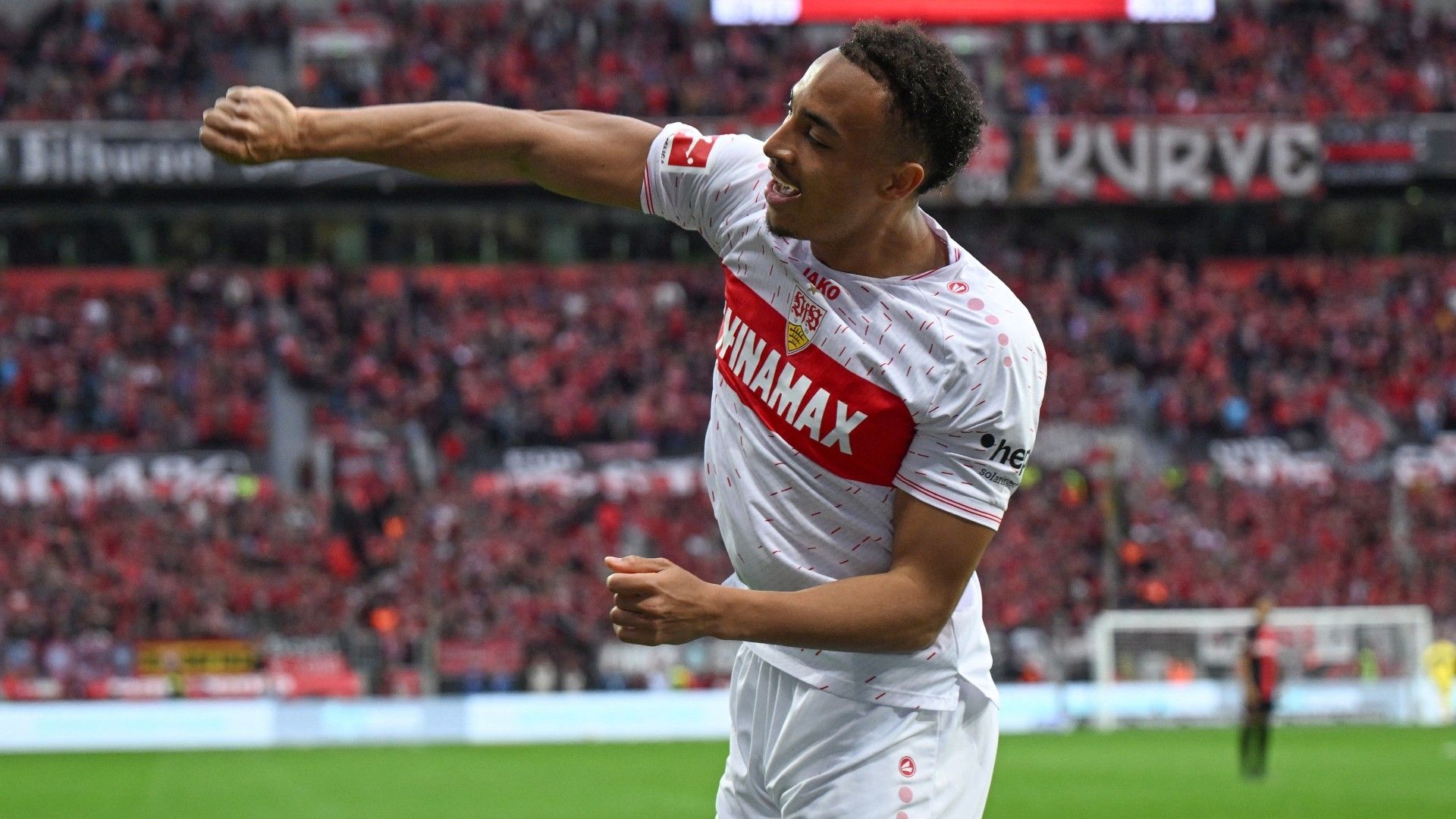 Stuttgart's German forward #18 Jamie Leweling celebrates