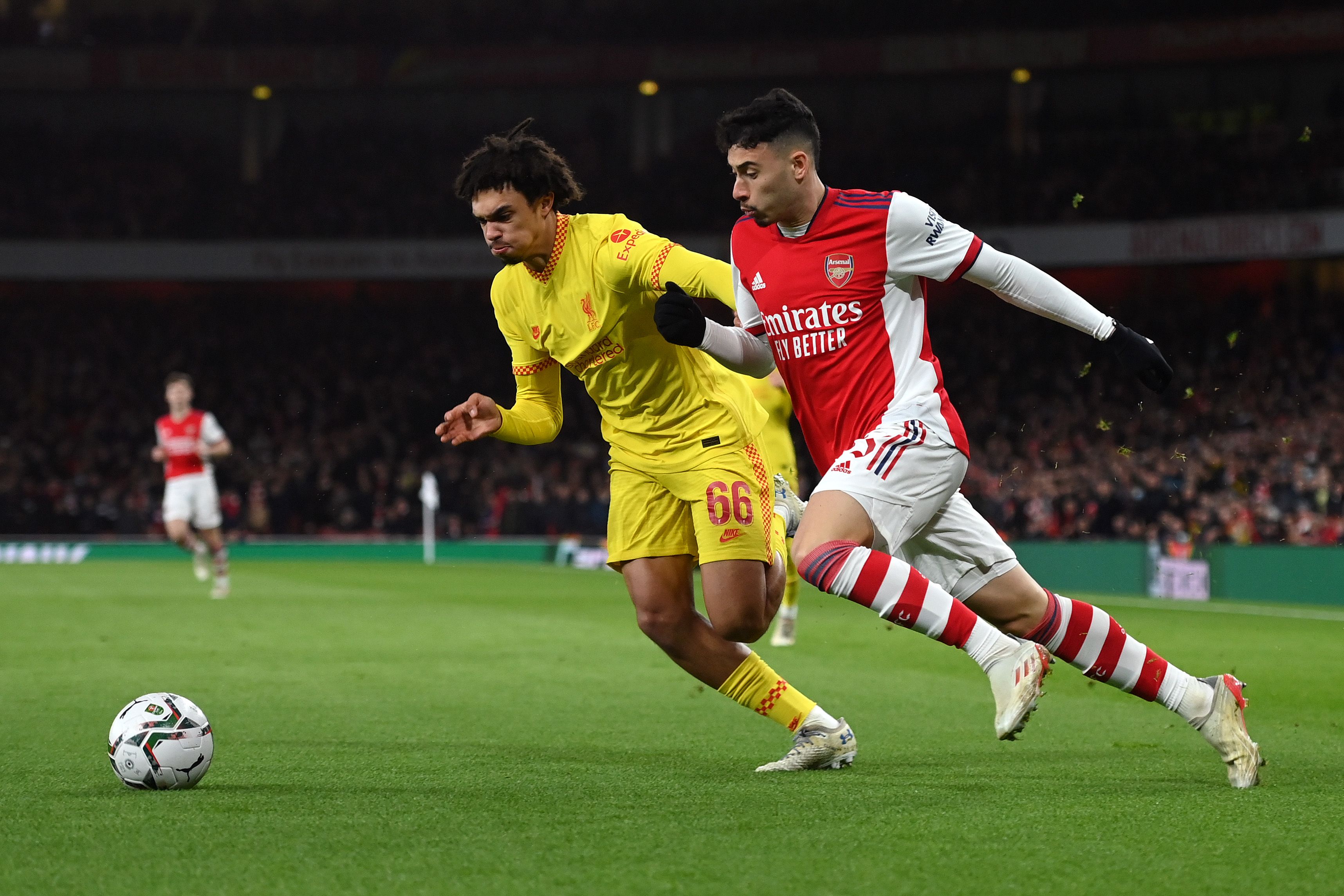 Gabriel Martinelli of Arsenal battles with Trent Alexander-Arnold of Liverpool