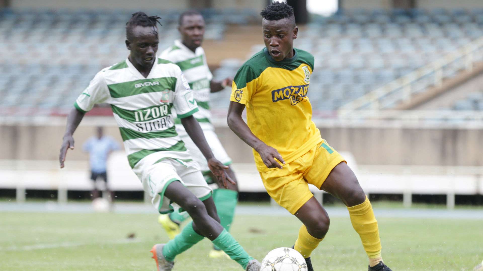 Robert Lokwang of Nzoia Sugar vs challenge David Owino of Mathare United.