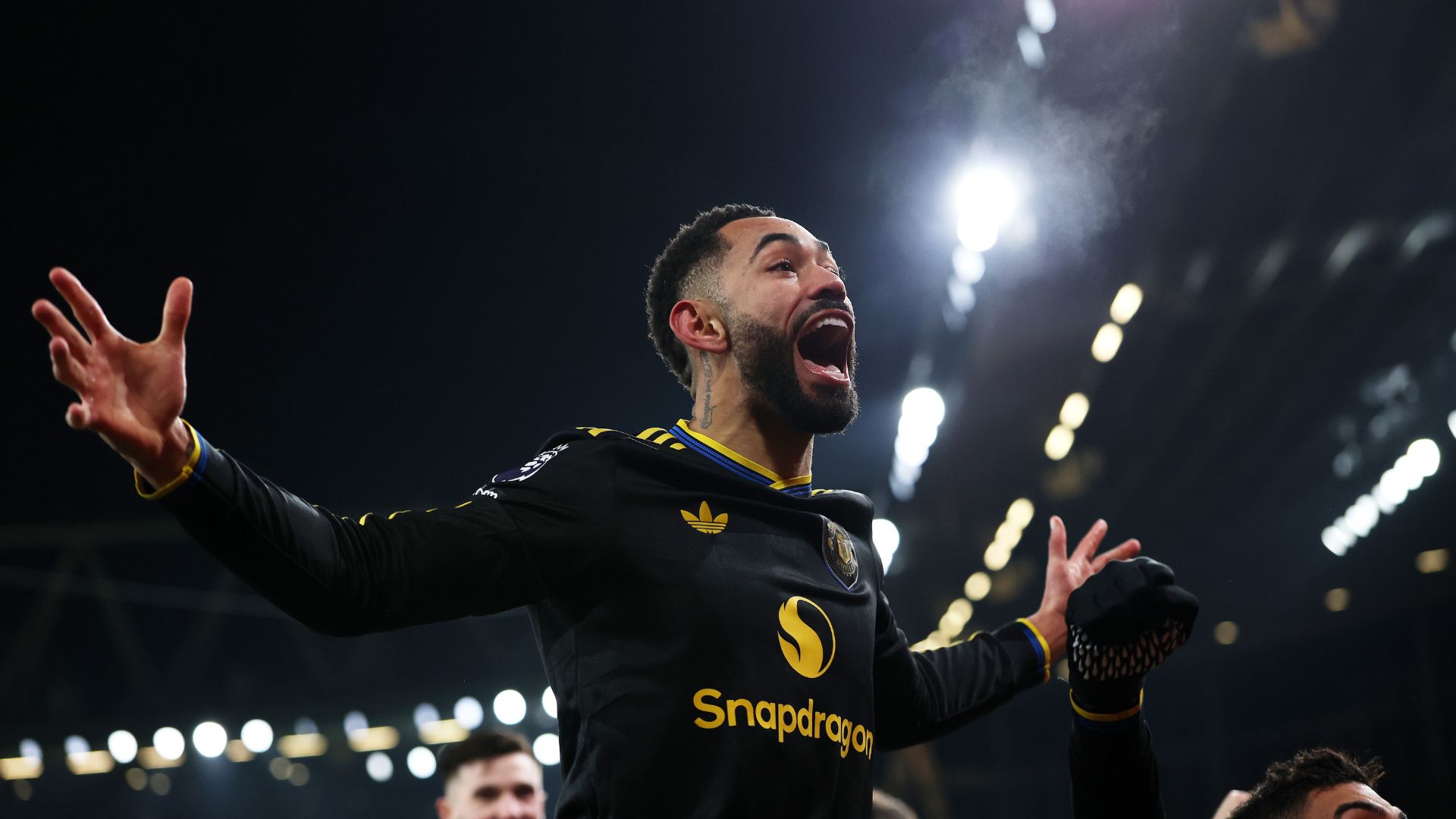 Matheus Cunha of Manchester United celebrates scoring his team's third goal during the Premier League match