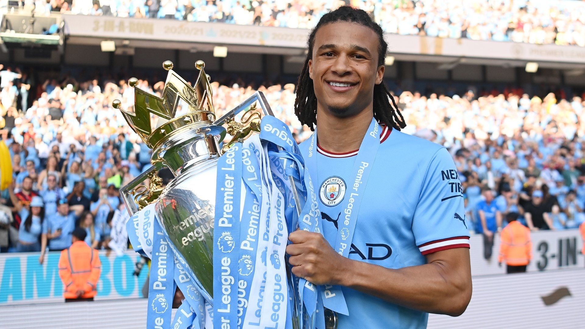 Nathan Ake Manchester City Premier League trophy 2022-23
