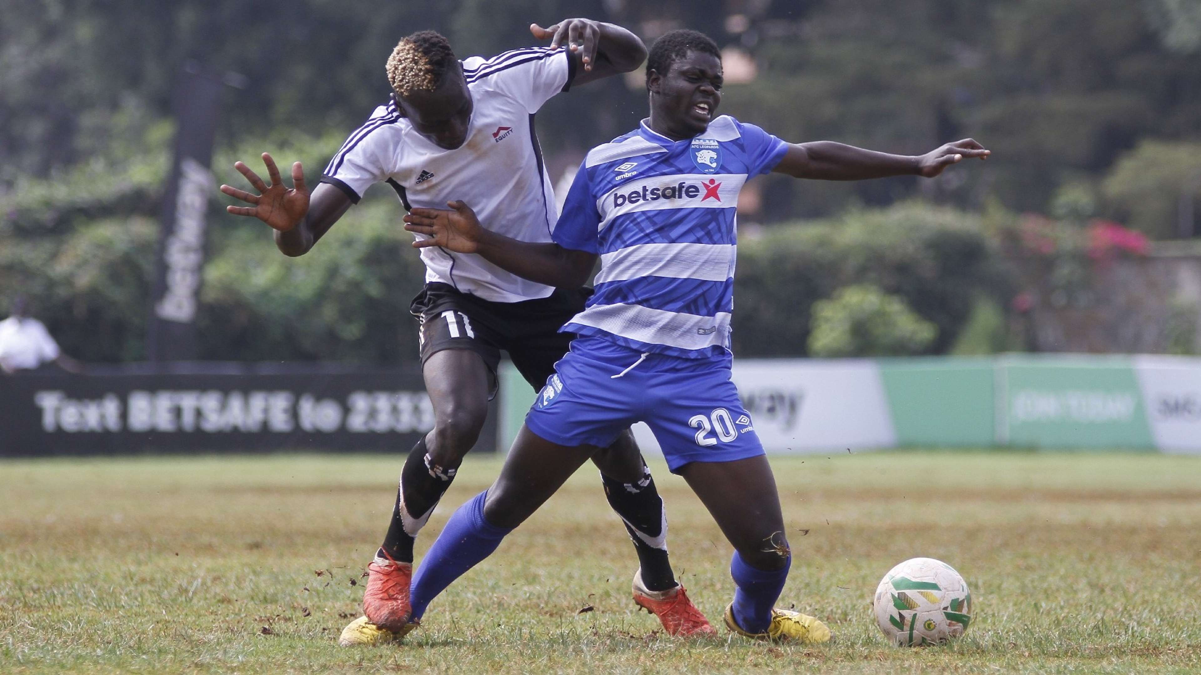 AFC Leopards Davis Sunguti trying to retain control of the ball from Equity's Bryson Wangai.