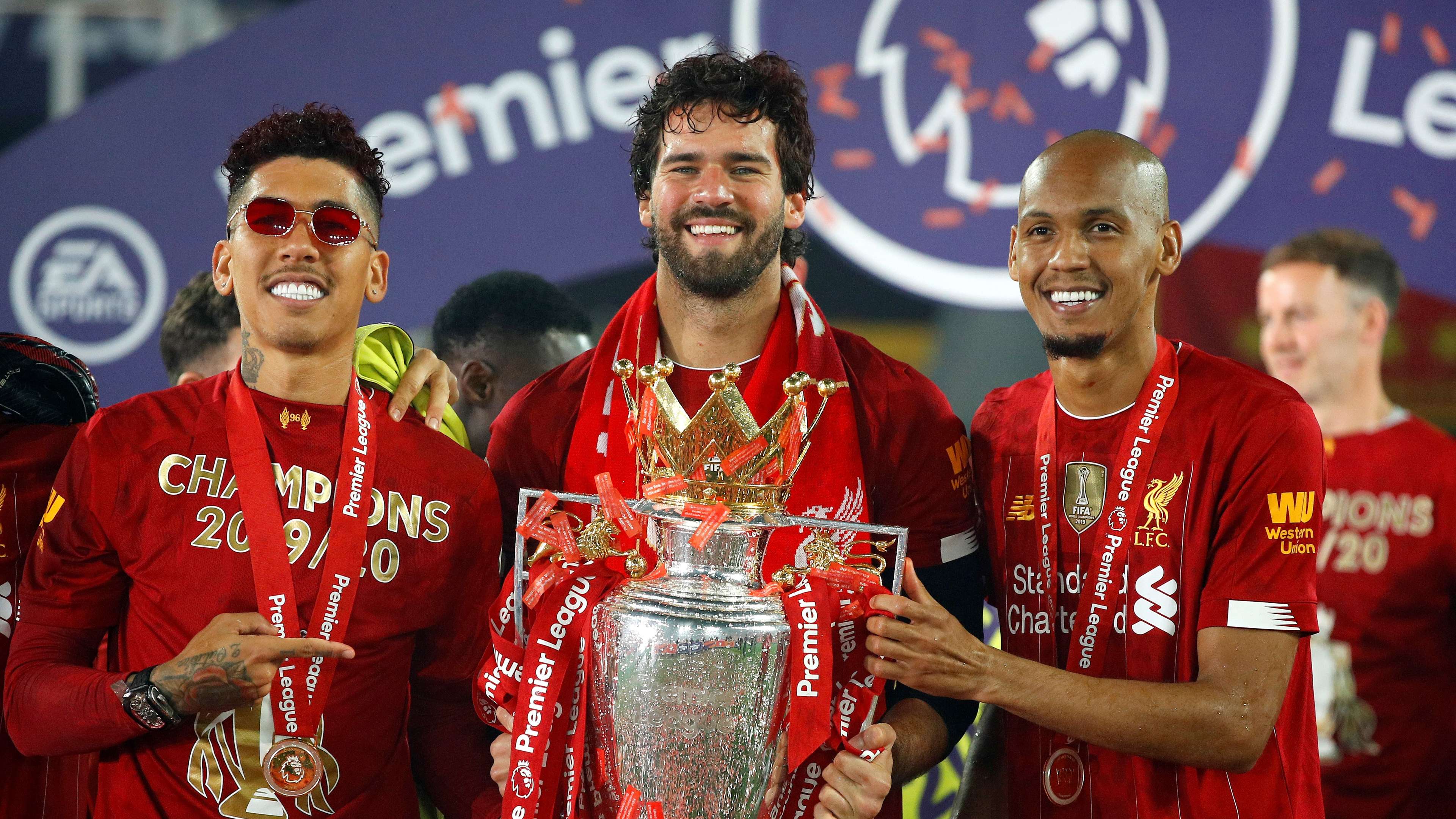 Liverpool lifts The Premier League trophy following the Premier League match between Liverpool FC and Chelsea FC at Anfield on July 22, 2020