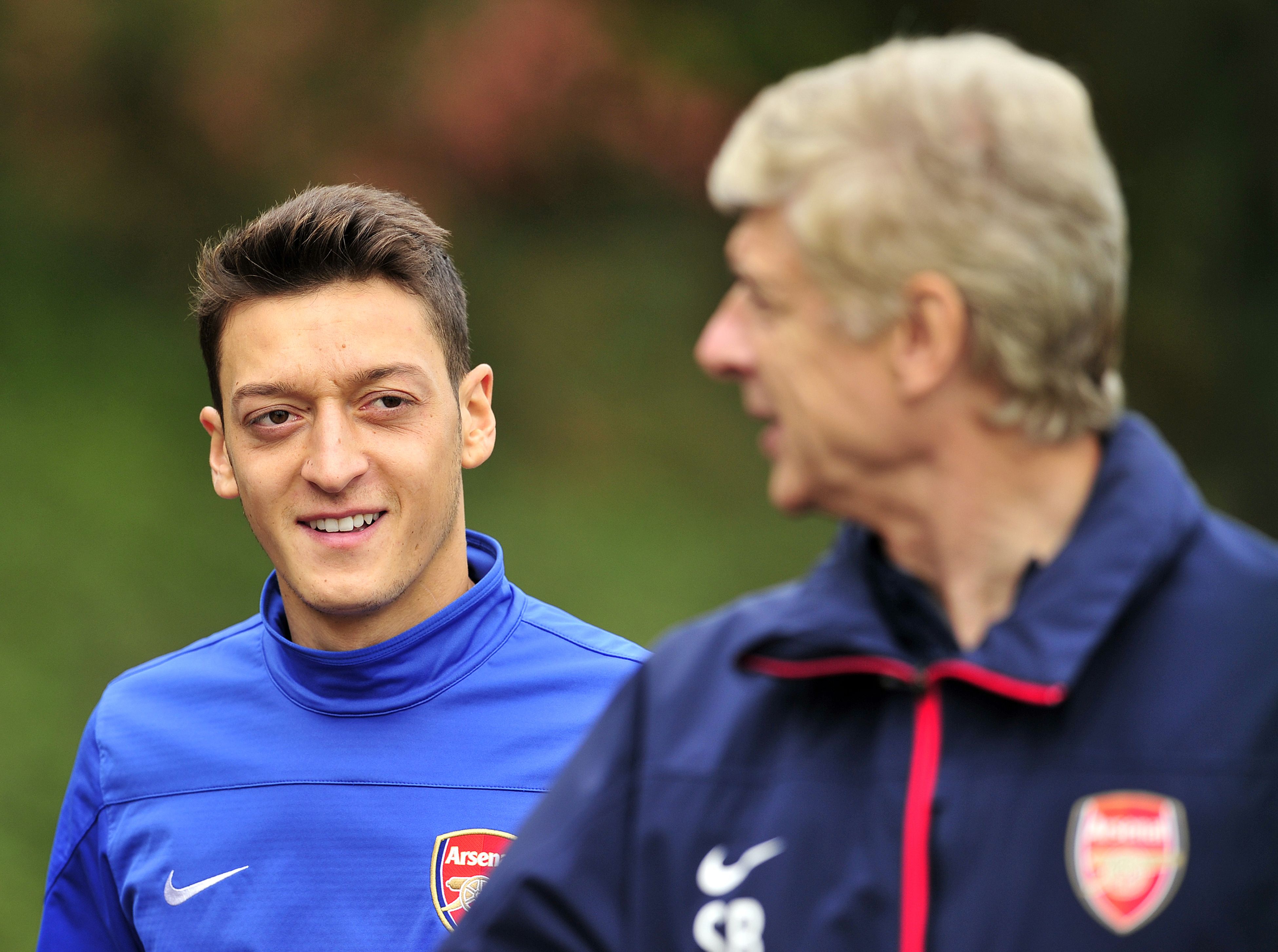 Arsenal duo Mesut Ozil and Arsene Wenger