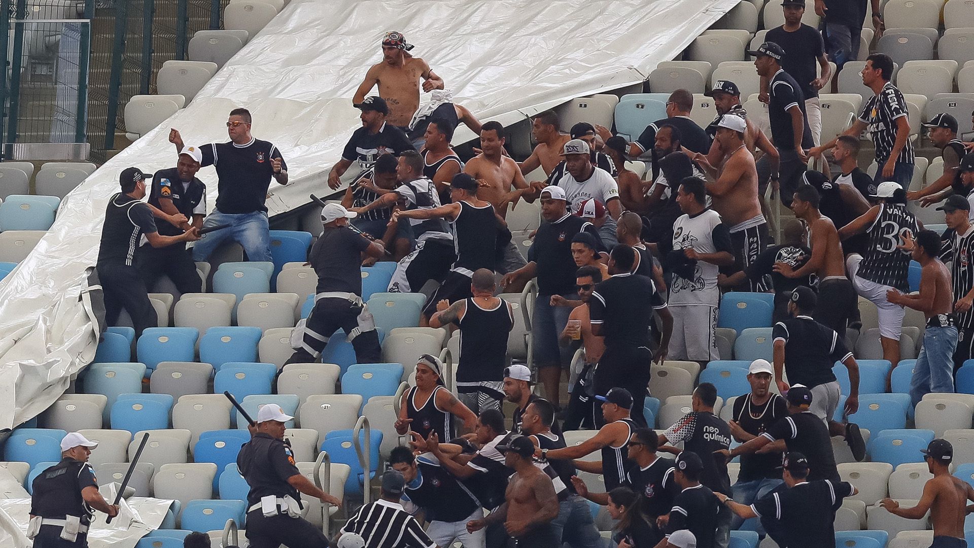 Brazilian football supporters fight