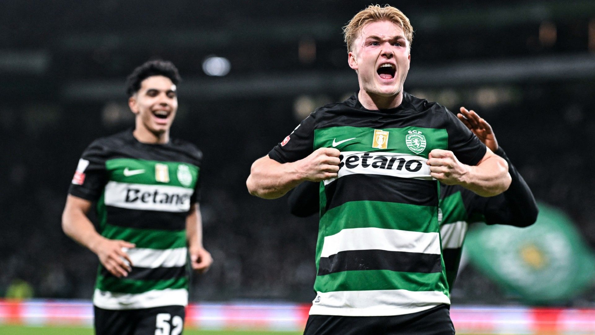   Sporting's Danish forward #19 Conrad Harder celebrates scoring 