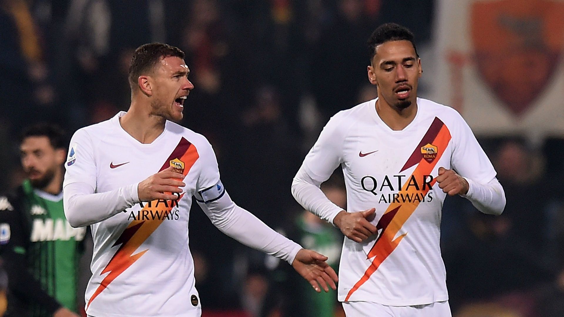 Edin Dzeko Chris Smalling Sassuolo Roma