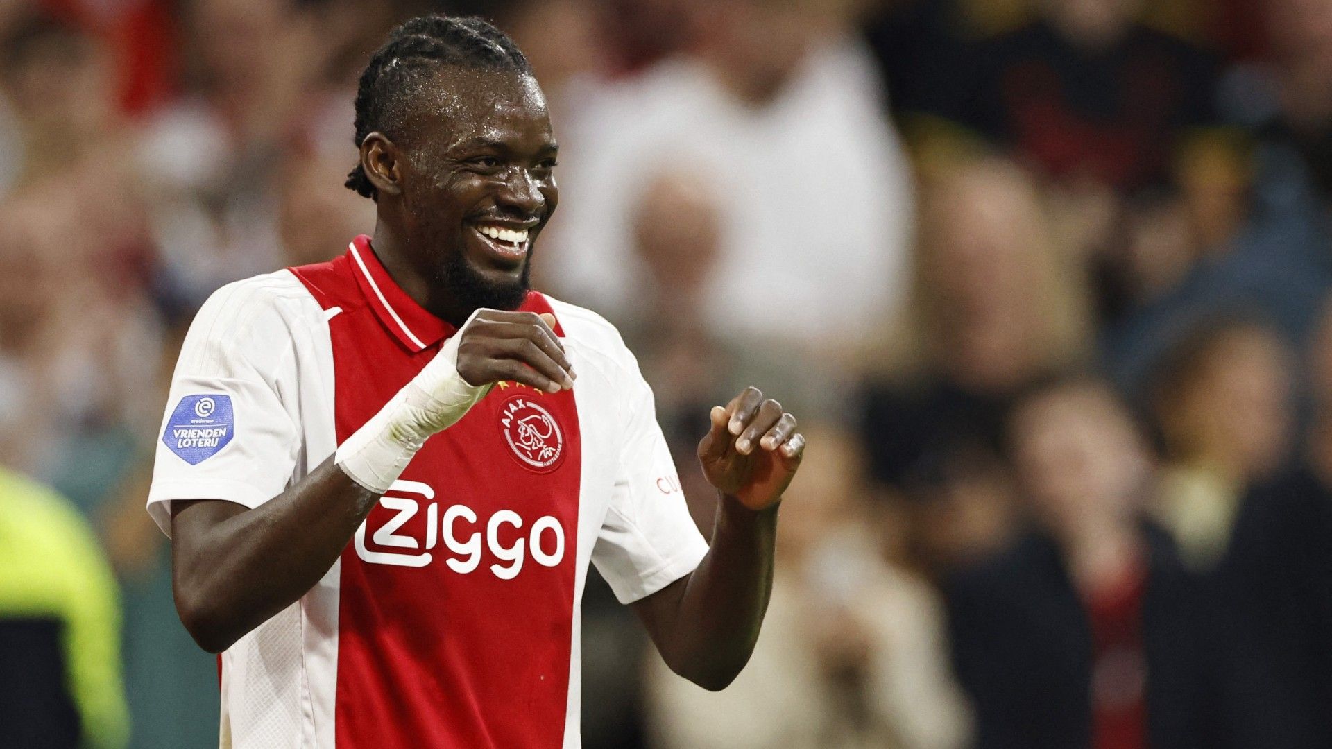 Ajax' Burkinabe forward #20 Bertrand Traore celebrates